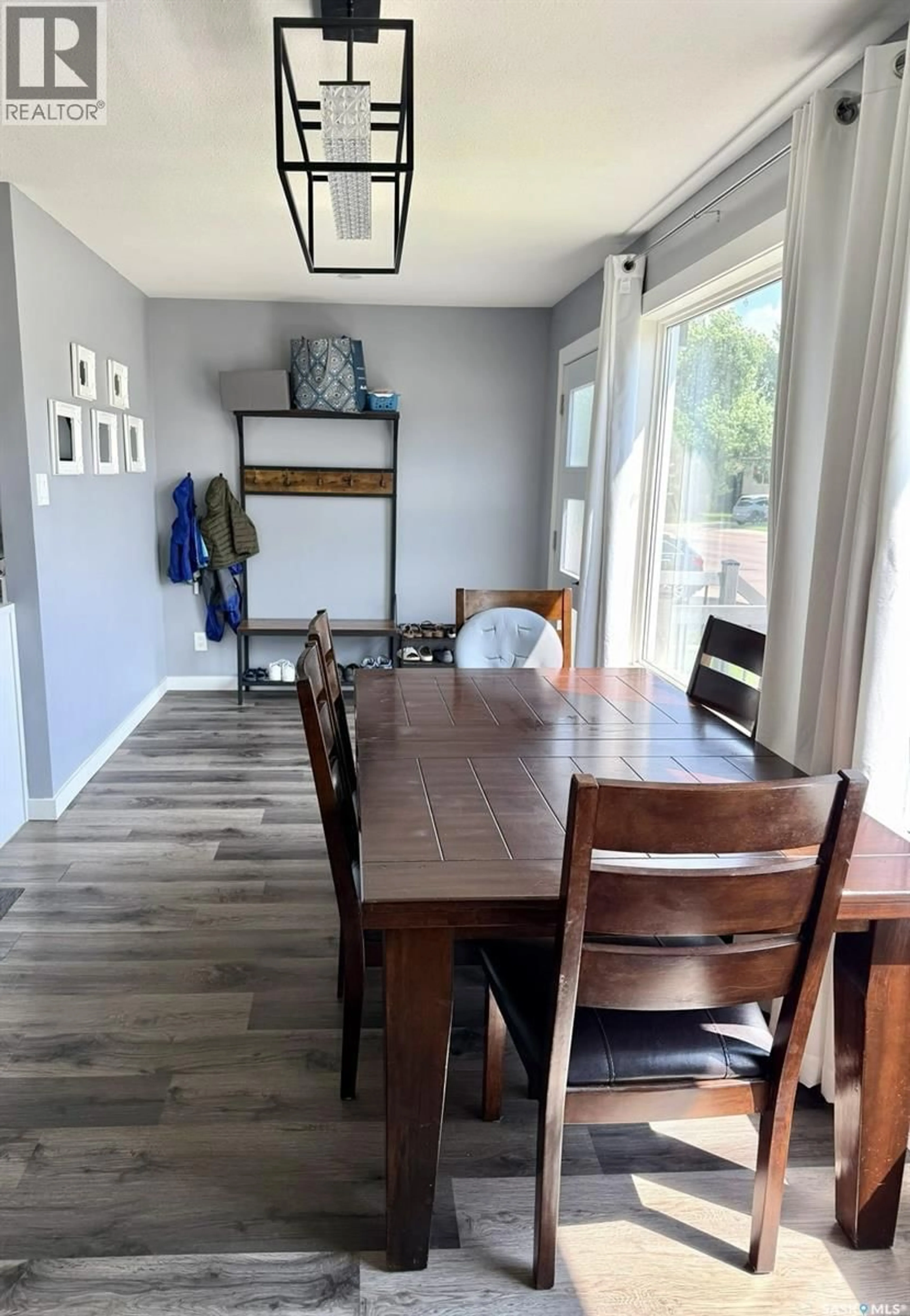 Dining room, wood/laminate floor for 510 REDBERRY ROAD, Saskatoon Saskatchewan S7K4S3