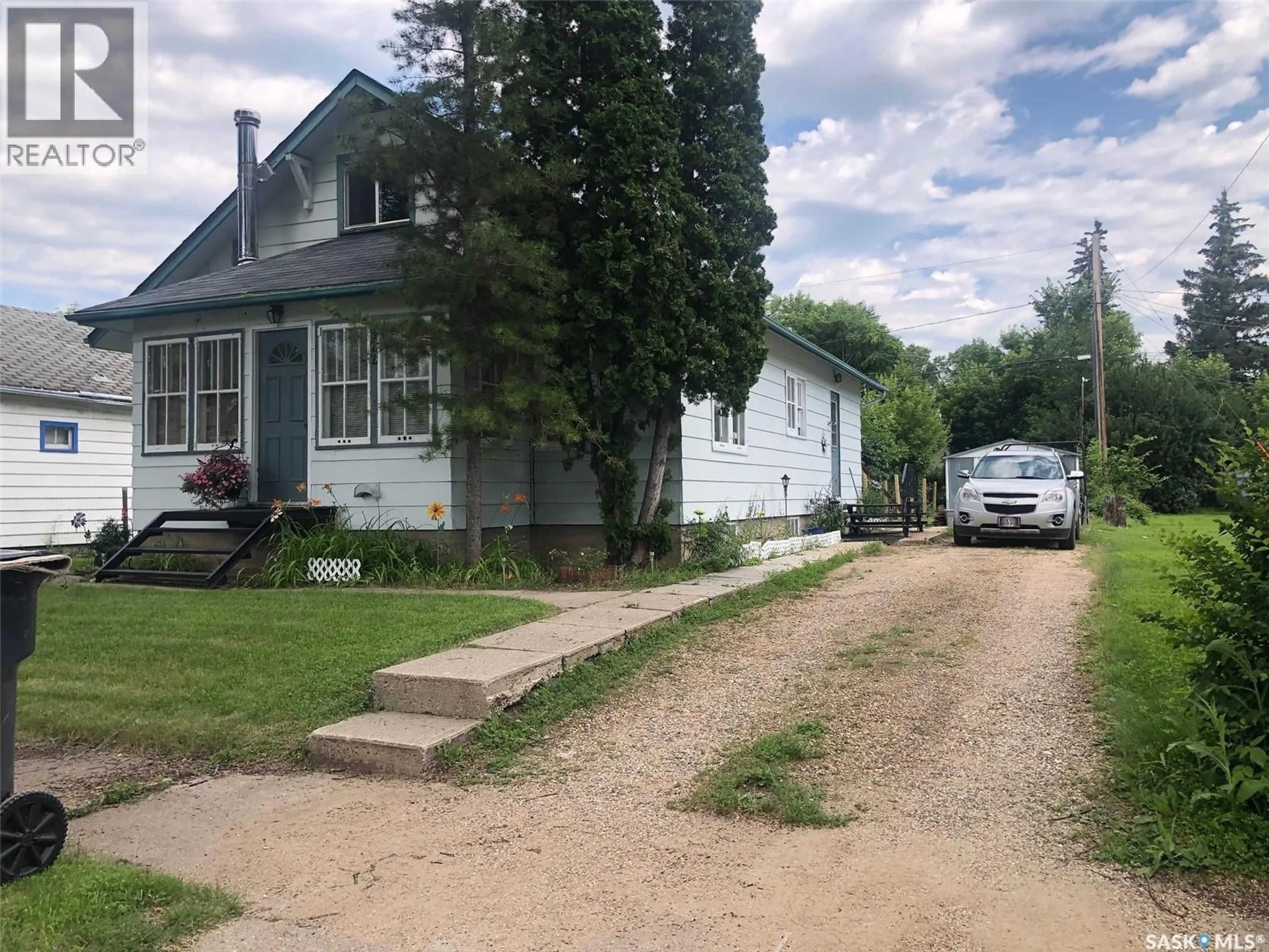 A pic from outside/outdoor area/front of a property/back of a property/a pic from drone, street for 322 5TH AVENUE, Canora Saskatchewan S0A0L0