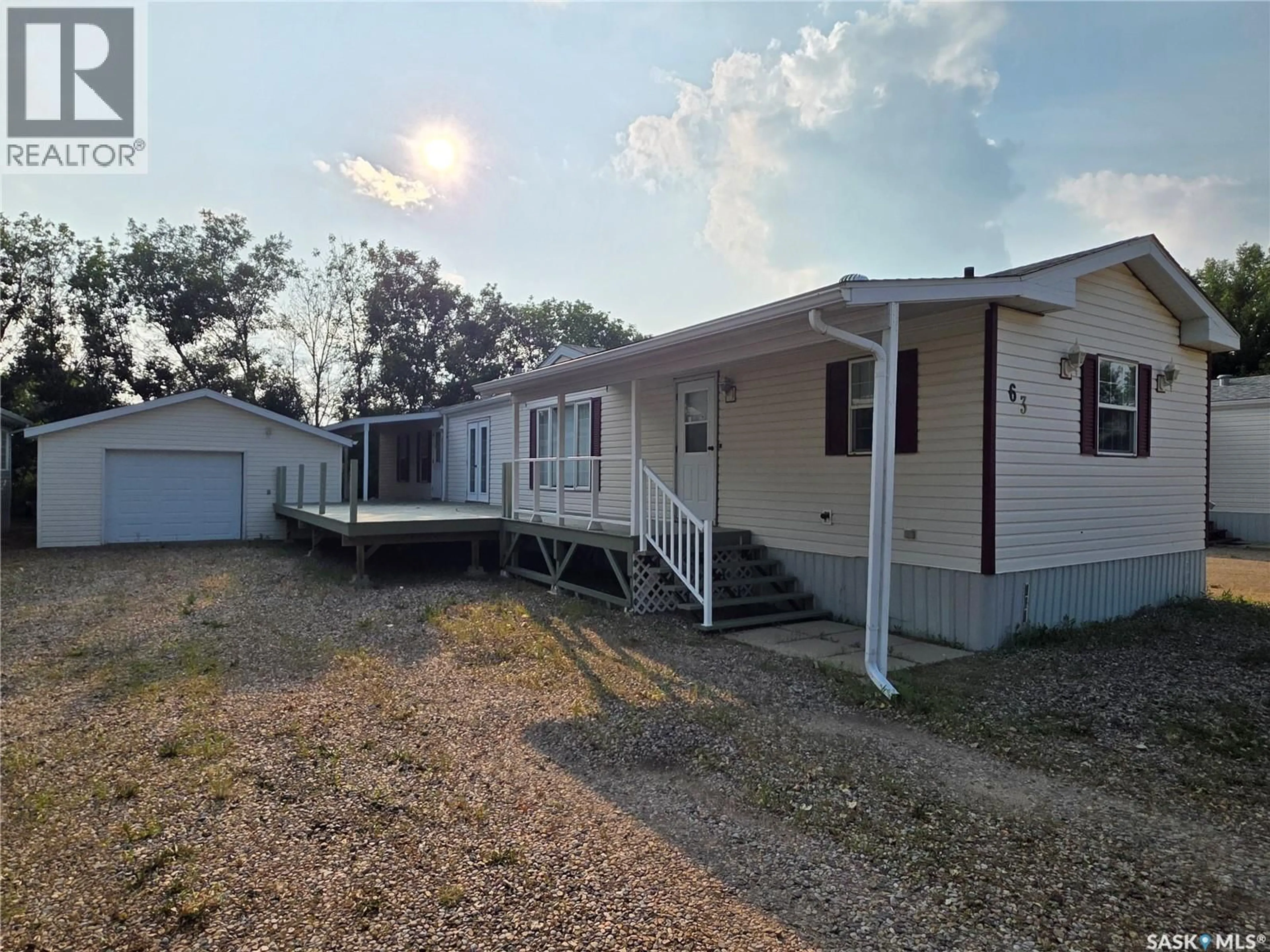 A pic from outside/outdoor area/front of a property/back of a property/a pic from drone, building for 63 PRAIRIE SUN COURT, Swift Current Saskatchewan S9H3X6