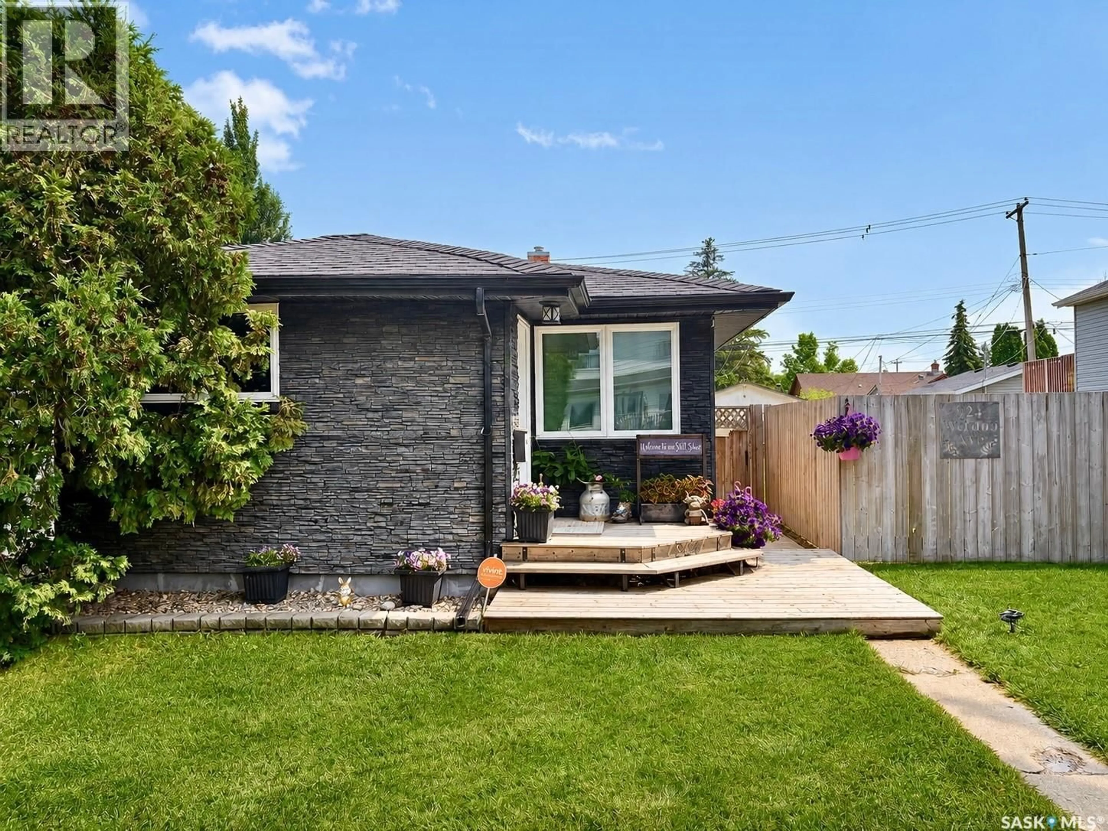 Home with brick exterior material, street for 924 WELDON AVENUE, Saskatoon Saskatchewan S7M2V6