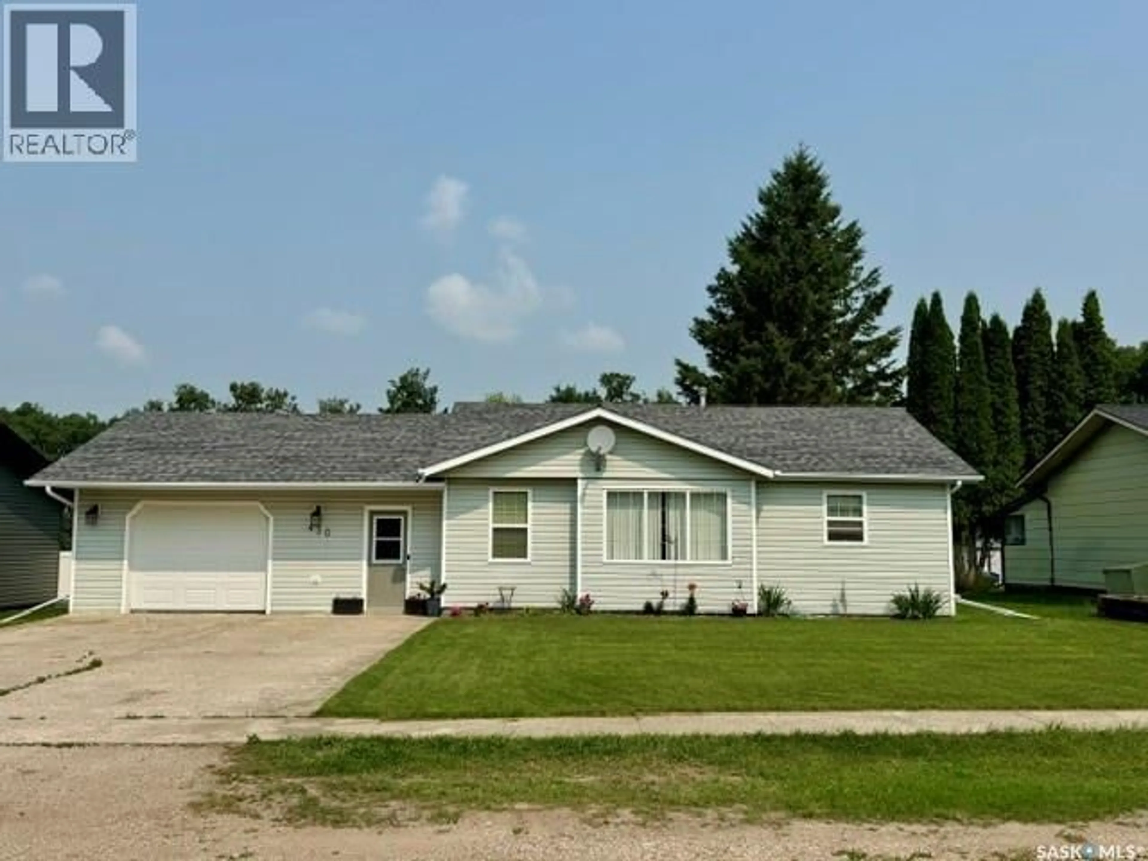 Home with vinyl exterior material, street for 430 CENTRE STREET, Middle Lake Saskatchewan S0K2X0