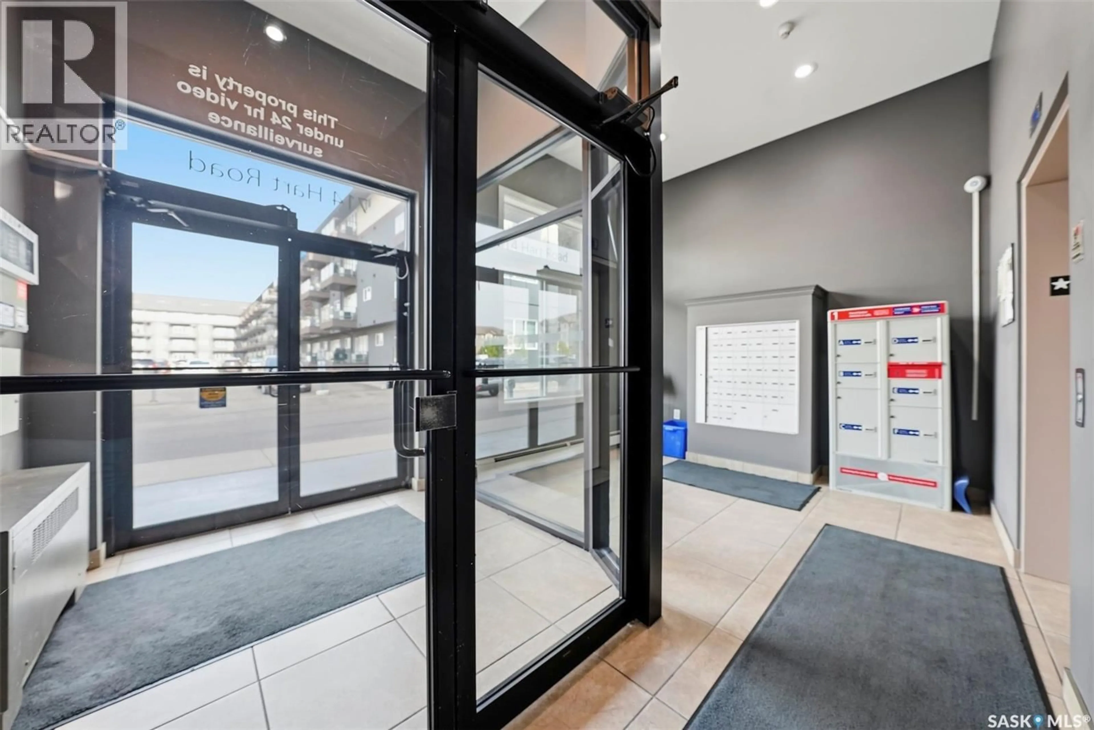 Indoor foyer for 104 - 714 HART ROAD, Saskatoon Saskatchewan S7M1L2