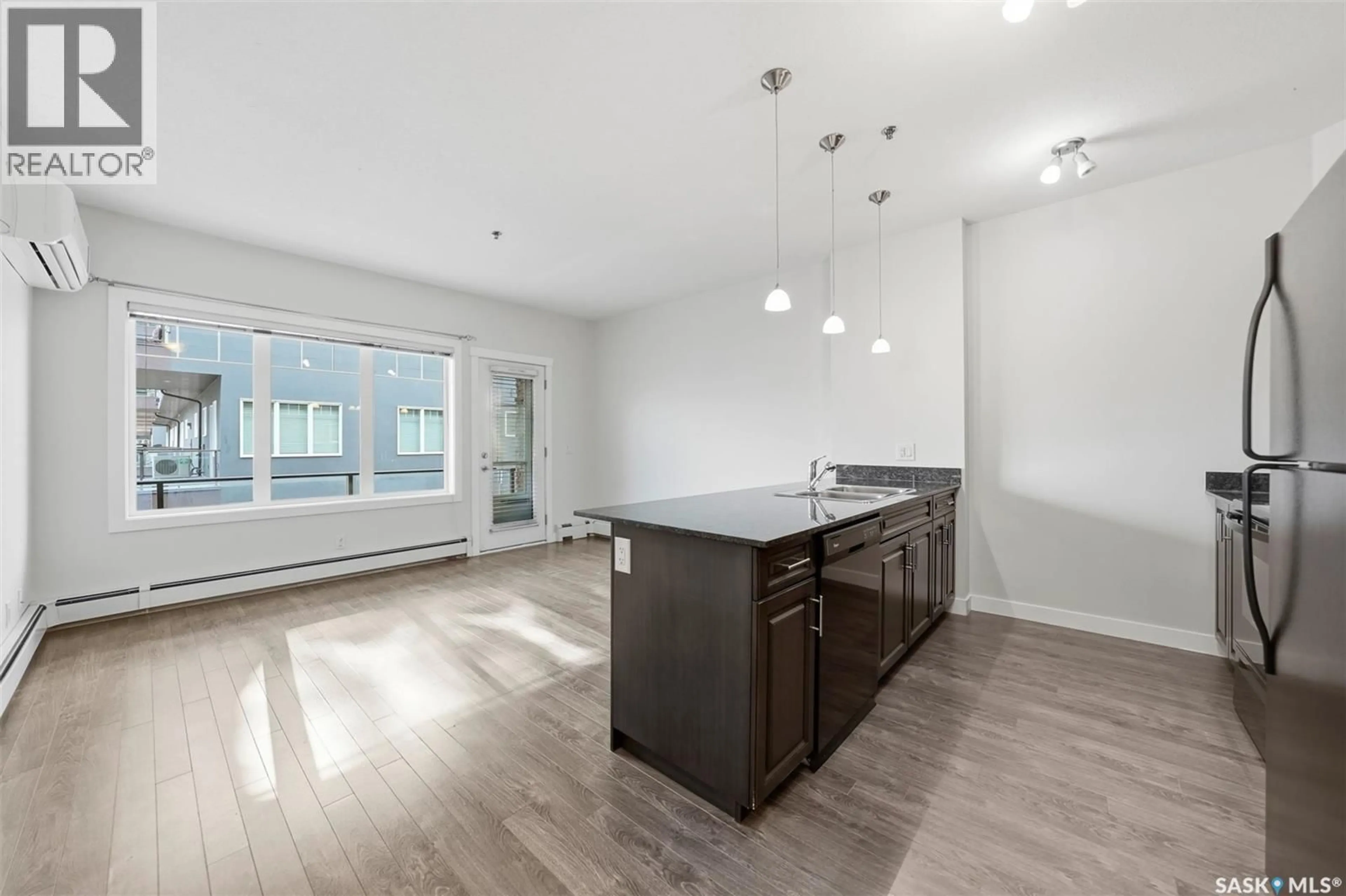 Open concept kitchen, unknown for 104 - 714 HART ROAD, Saskatoon Saskatchewan S7M1L2