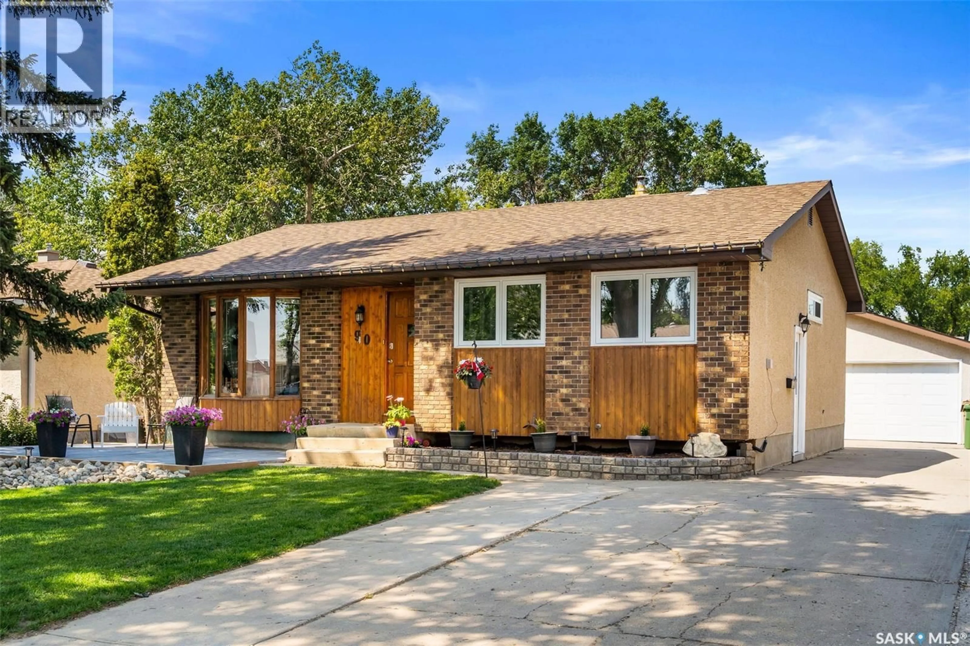 Home with brick exterior material, street for 90 WALDEN CRESCENT, Regina Saskatchewan S4N1L3