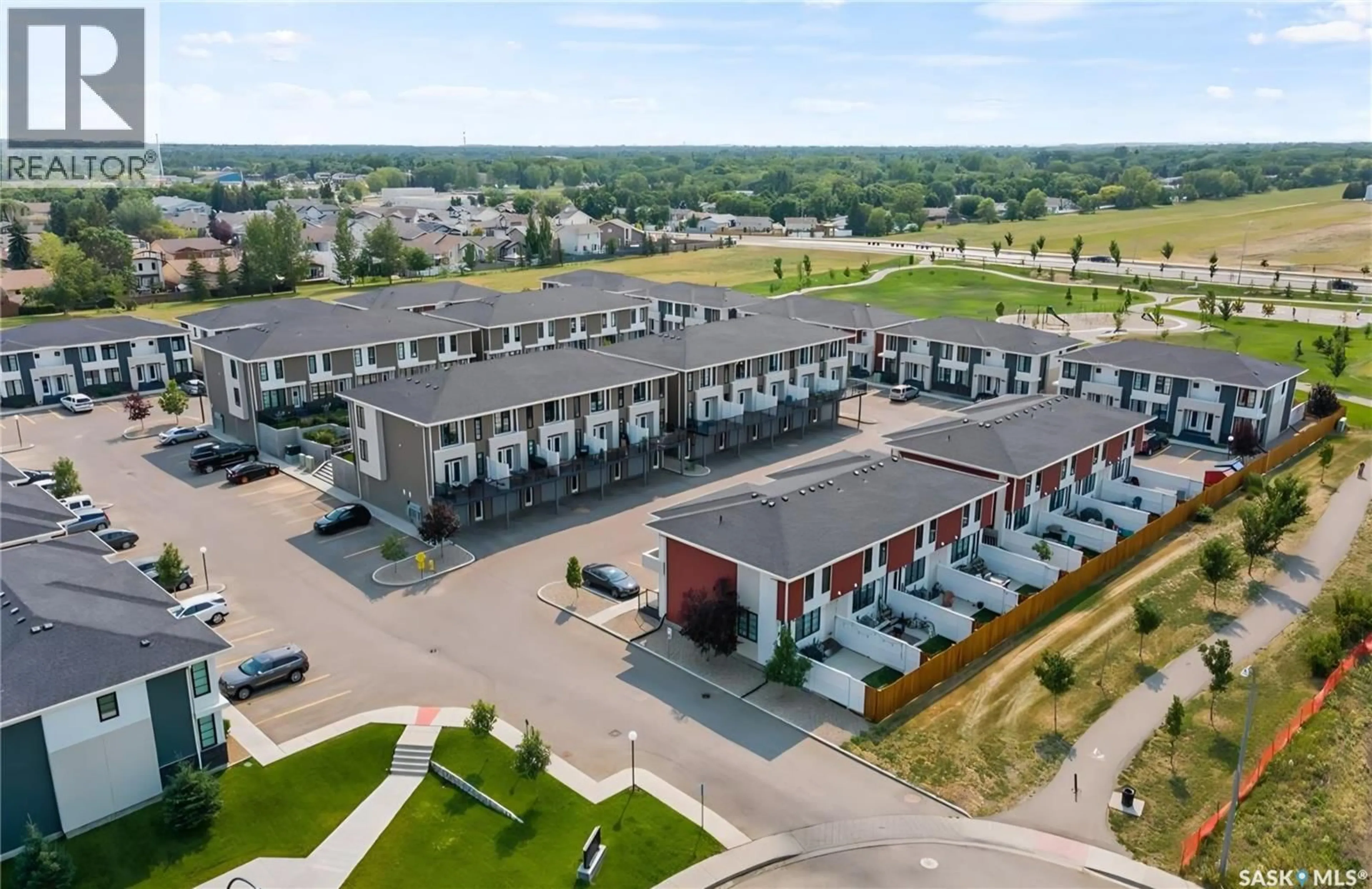 A pic from outside/outdoor area/front of a property/back of a property/a pic from drone, building for 204 - 3229 ELGAARD DRIVE, Regina Saskatchewan S4X0L2