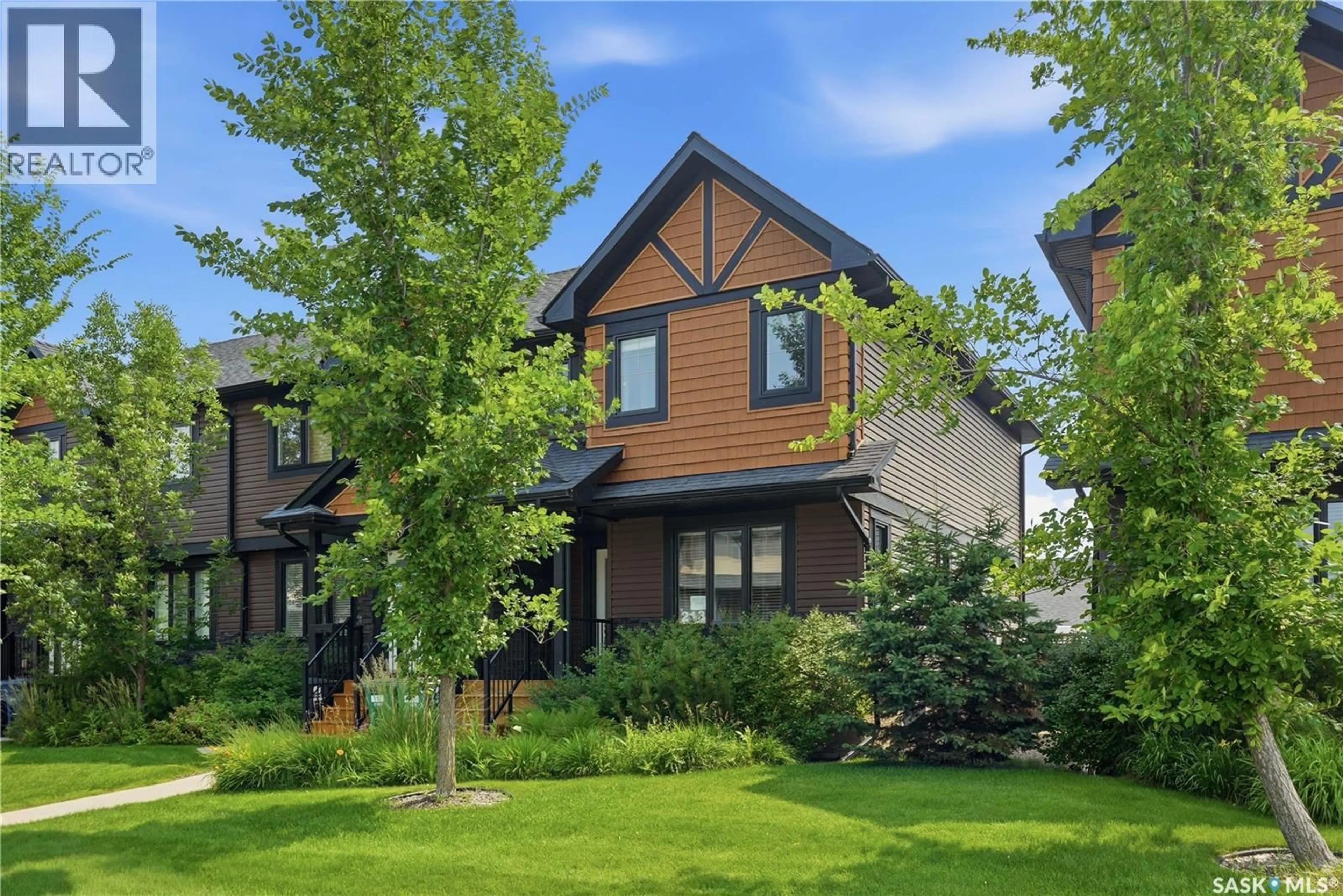 Home with brick exterior material, street for 213 RAJPUT WAY, Saskatoon Saskatchewan S7W0T3