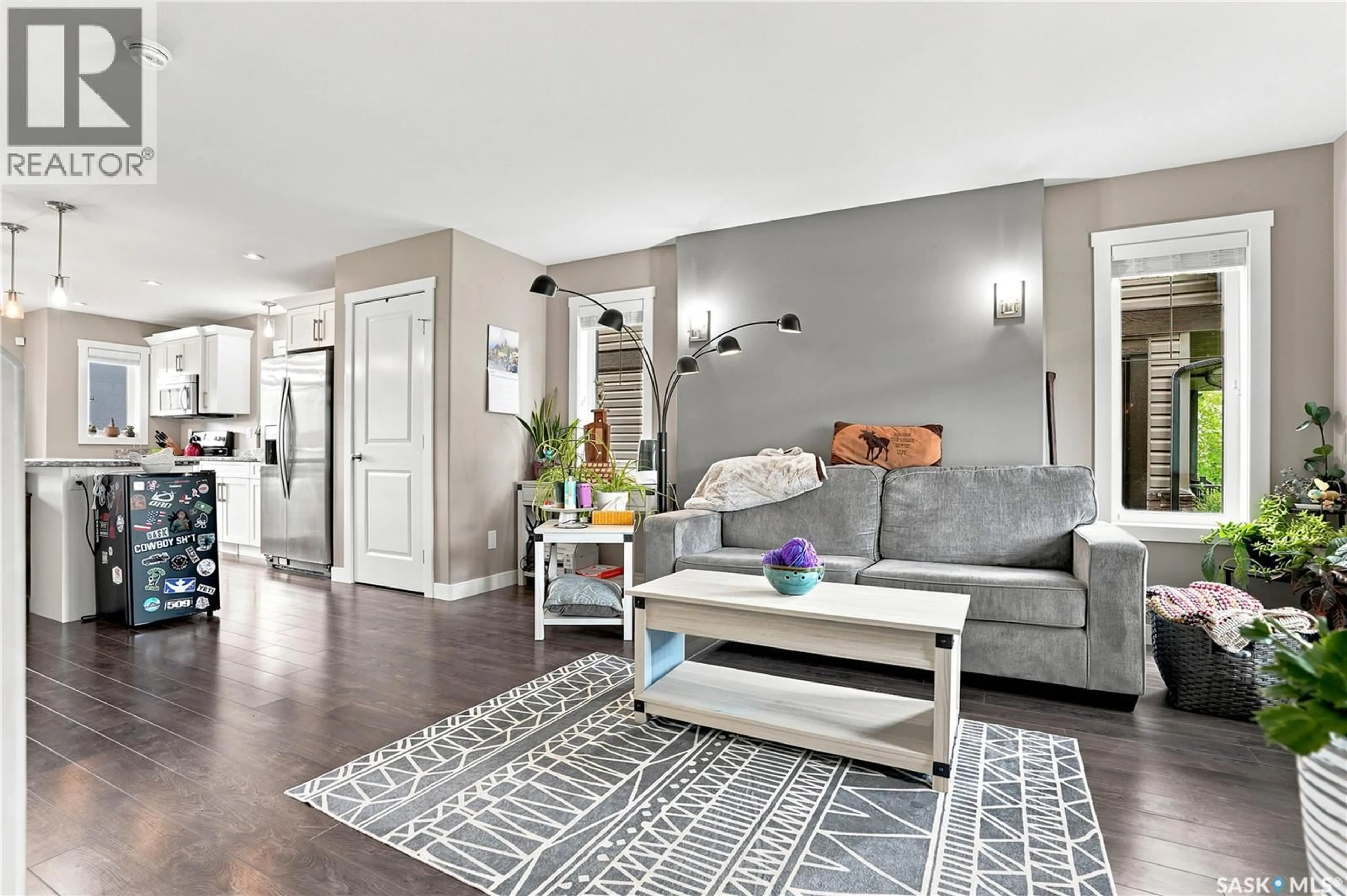 Living room with furniture, unknown for 213 RAJPUT WAY, Saskatoon Saskatchewan S7W0T3