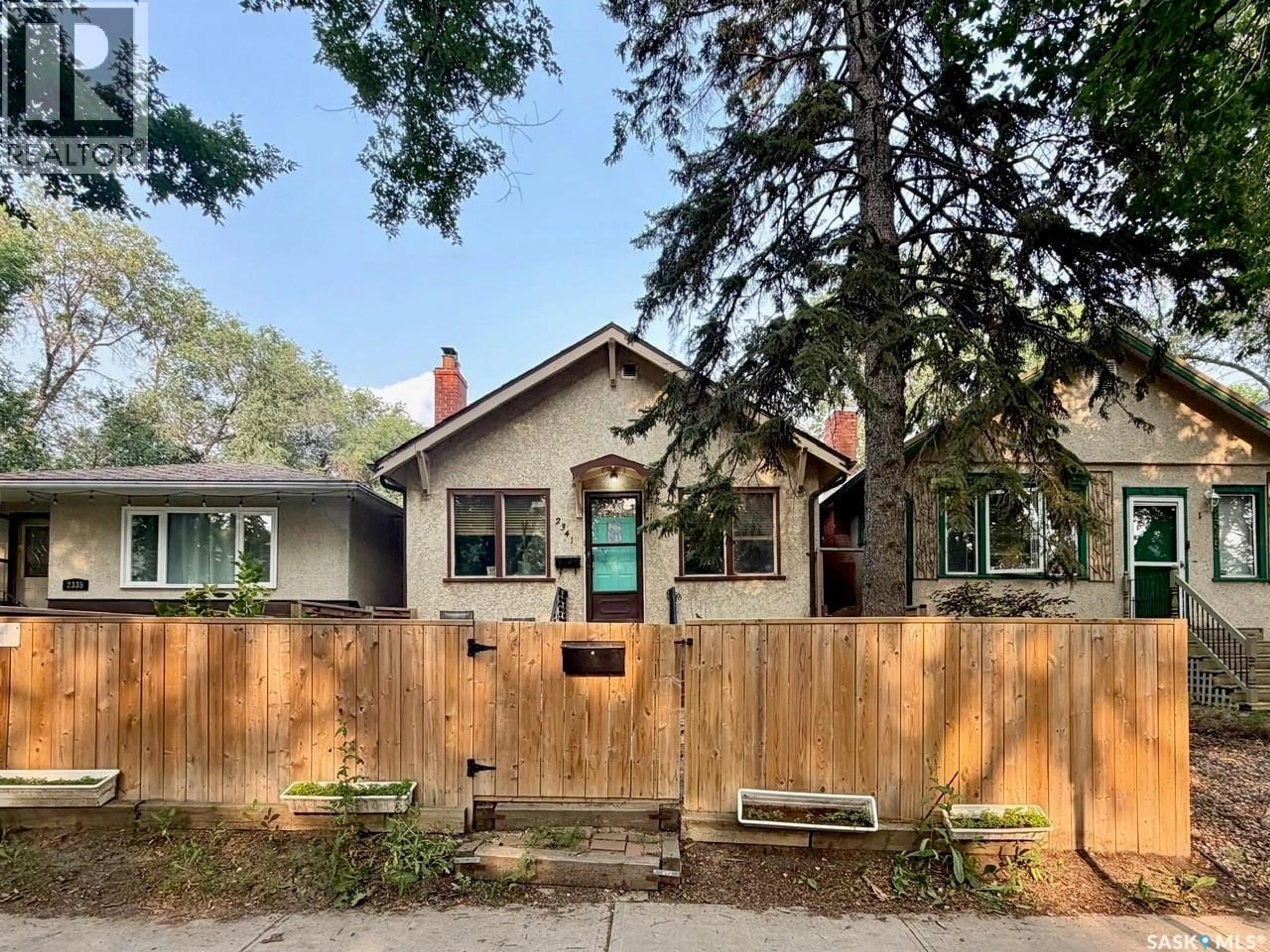 Home with brick exterior material, street for 2341 ELPHINSTONE STREET, Regina Saskatchewan S4T3P2