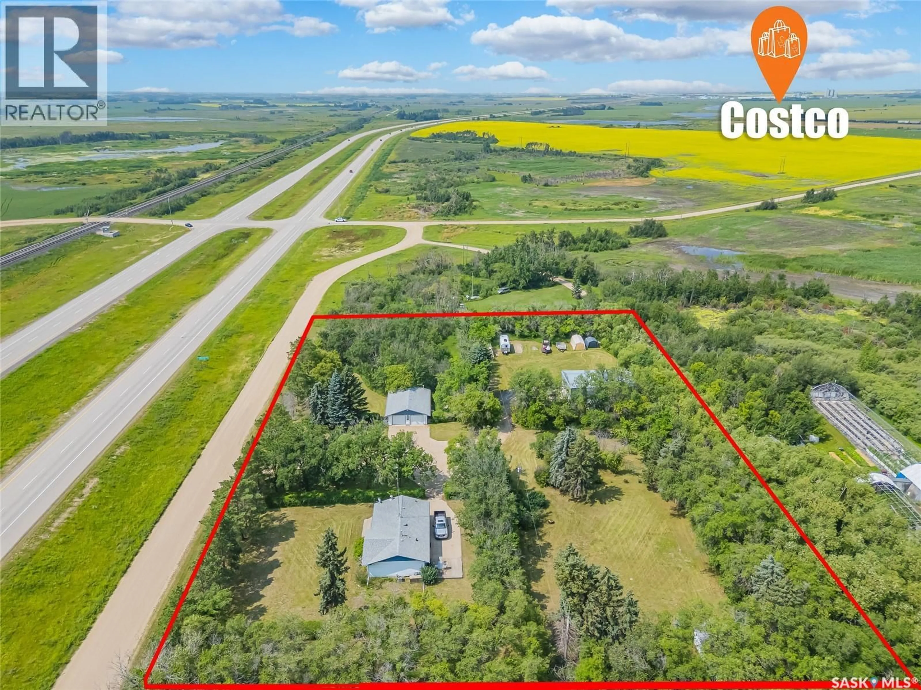 A pic from outside/outdoor area/front of a property/back of a property/a pic from drone, building for HIGHWAY 16, Blucher Rm No. 343 Saskatchewan S0K0Y0