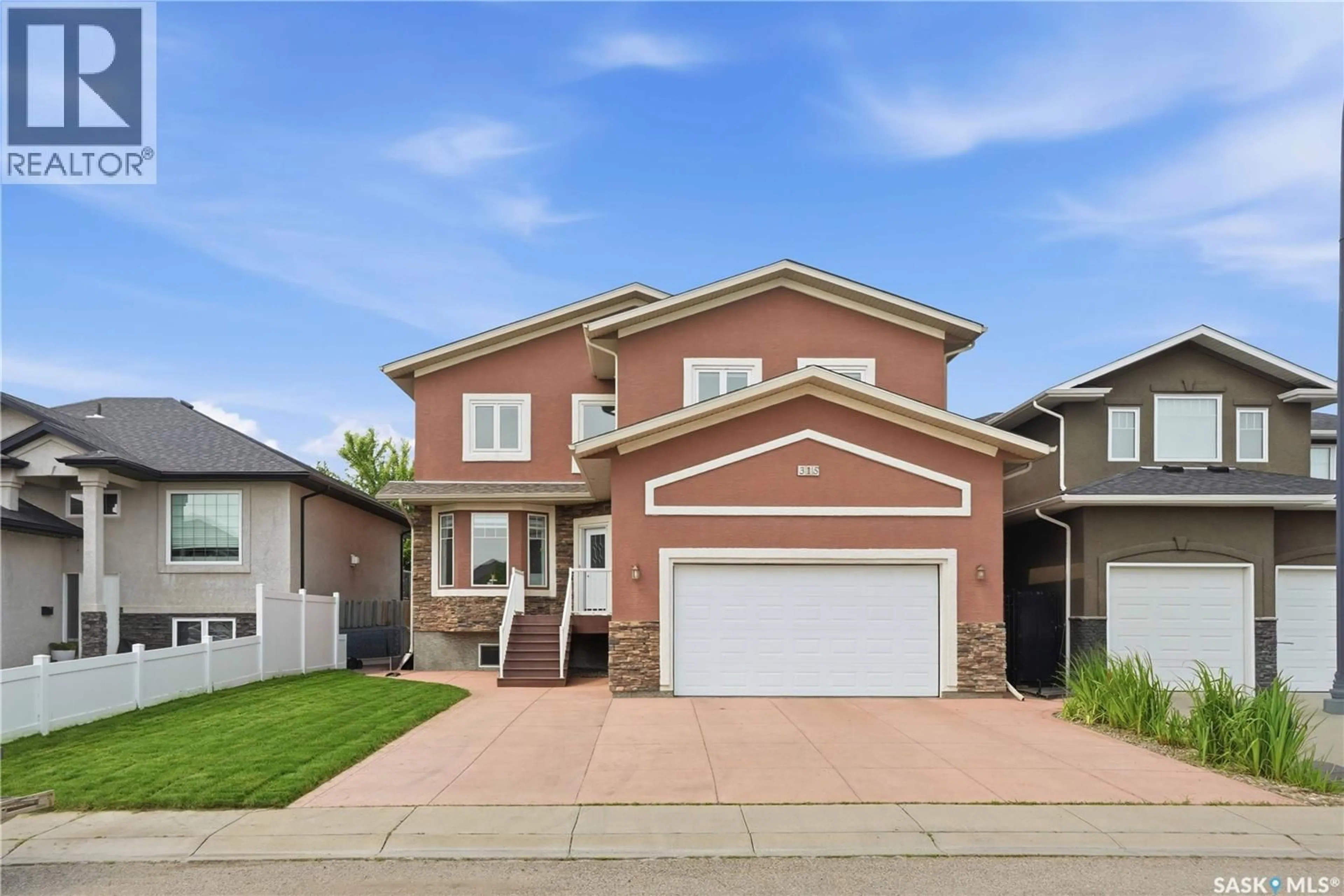 Home with brick exterior material, street for 315 WATERS CRESCENT, Saskatoon Saskatchewan S7W0A5