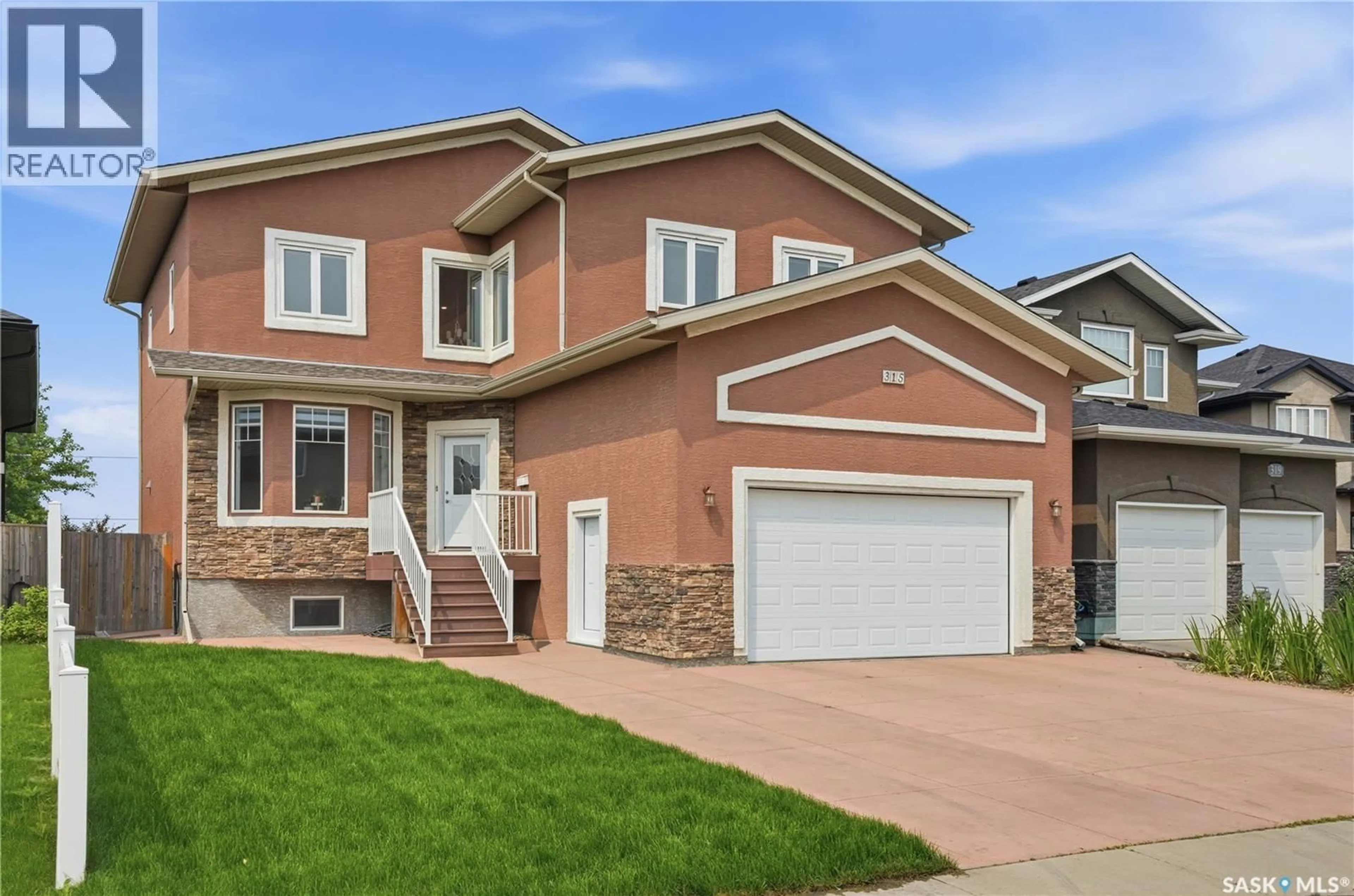 Home with brick exterior material, street for 315 WATERS CRESCENT, Saskatoon Saskatchewan S7W0A5
