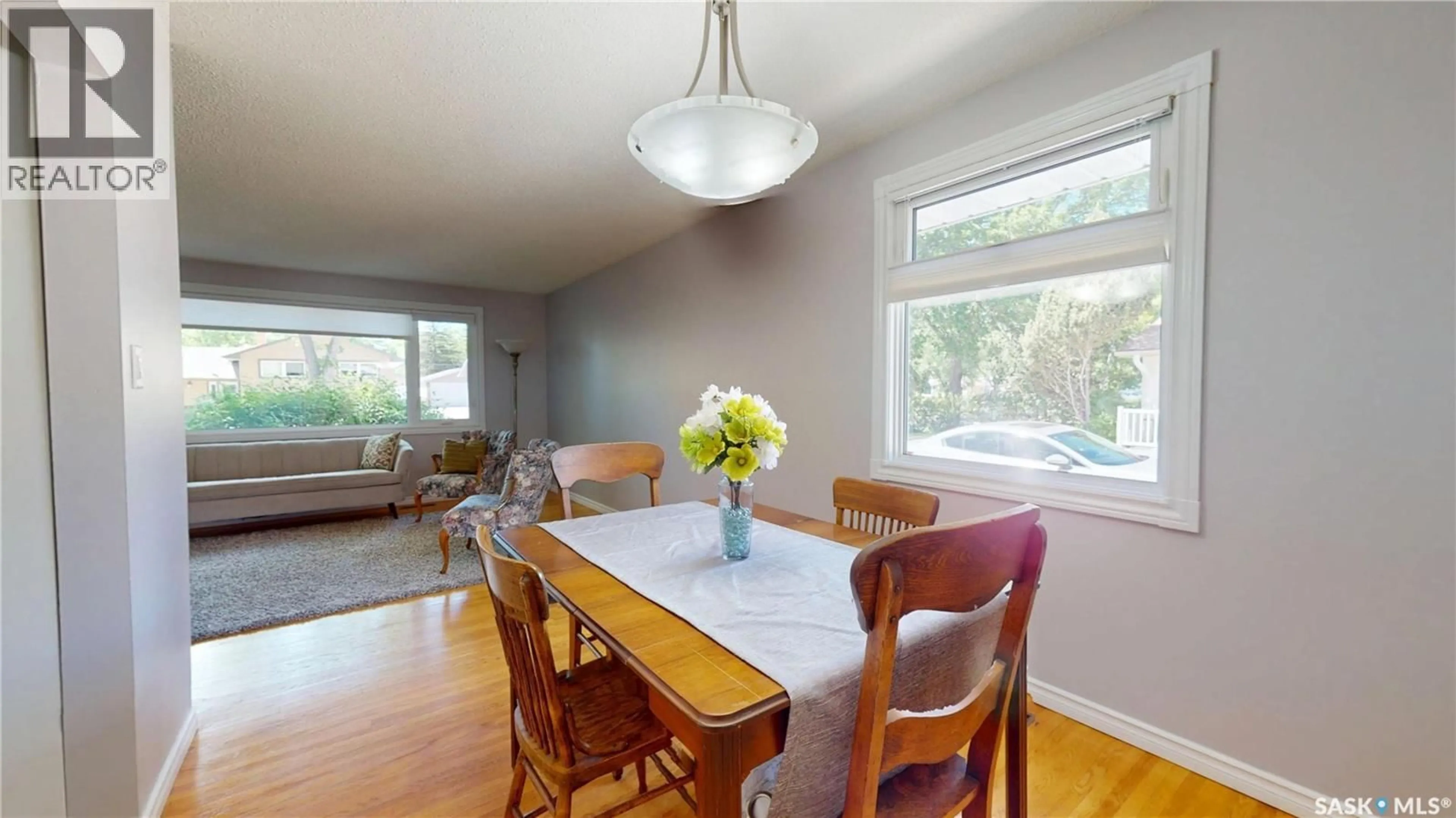 Dining room, wood/laminate floor for 85 BOBOLINK BAY, Regina Saskatchewan S4S4K2