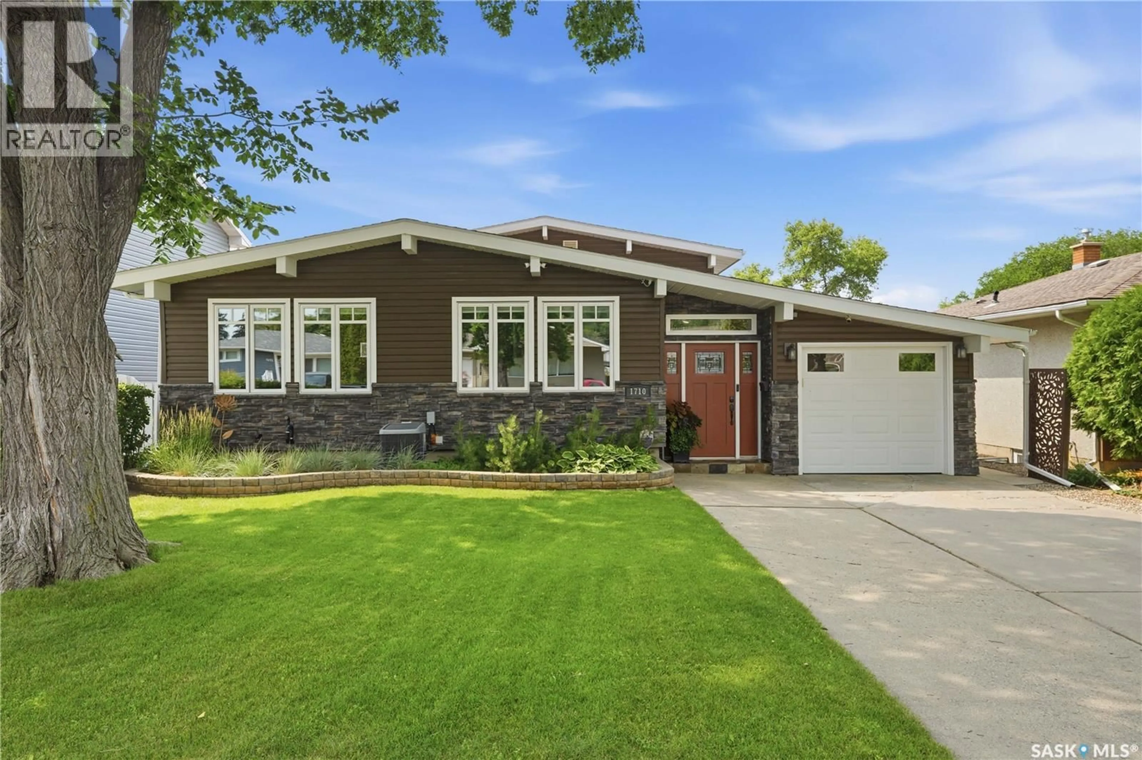Home with brick exterior material, street for 1710 CAMERON AVENUE, Saskatoon Saskatchewan S7H3N3