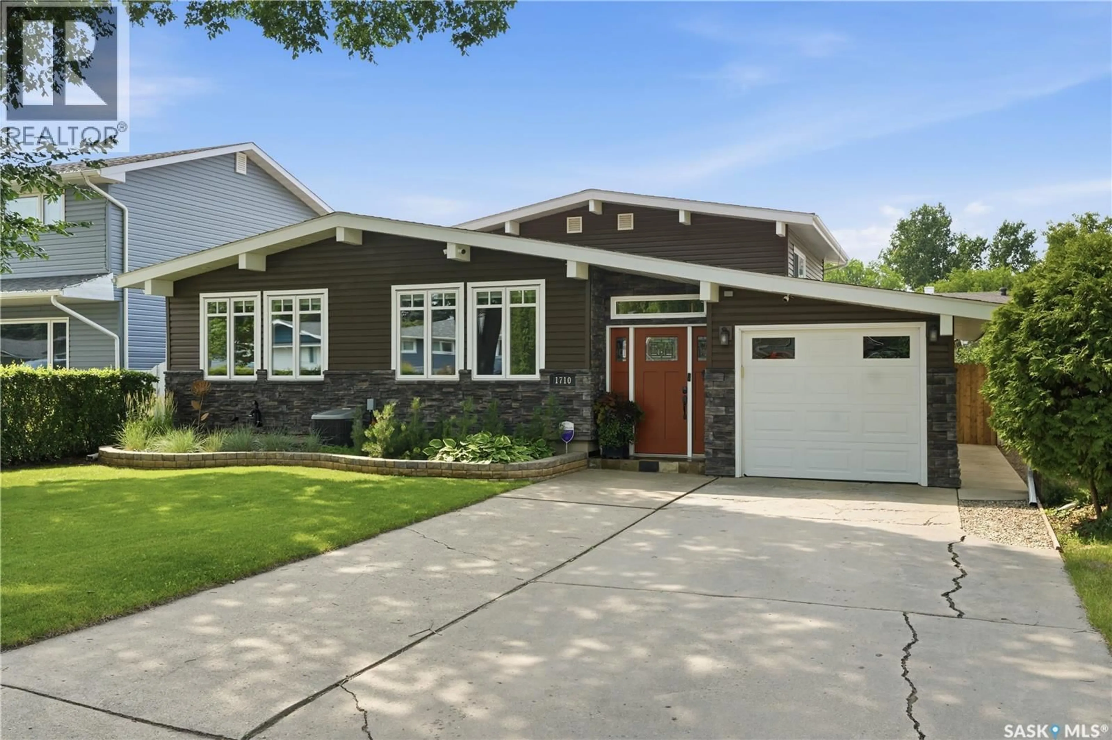 Home with brick exterior material, street for 1710 CAMERON AVENUE, Saskatoon Saskatchewan S7H3N3