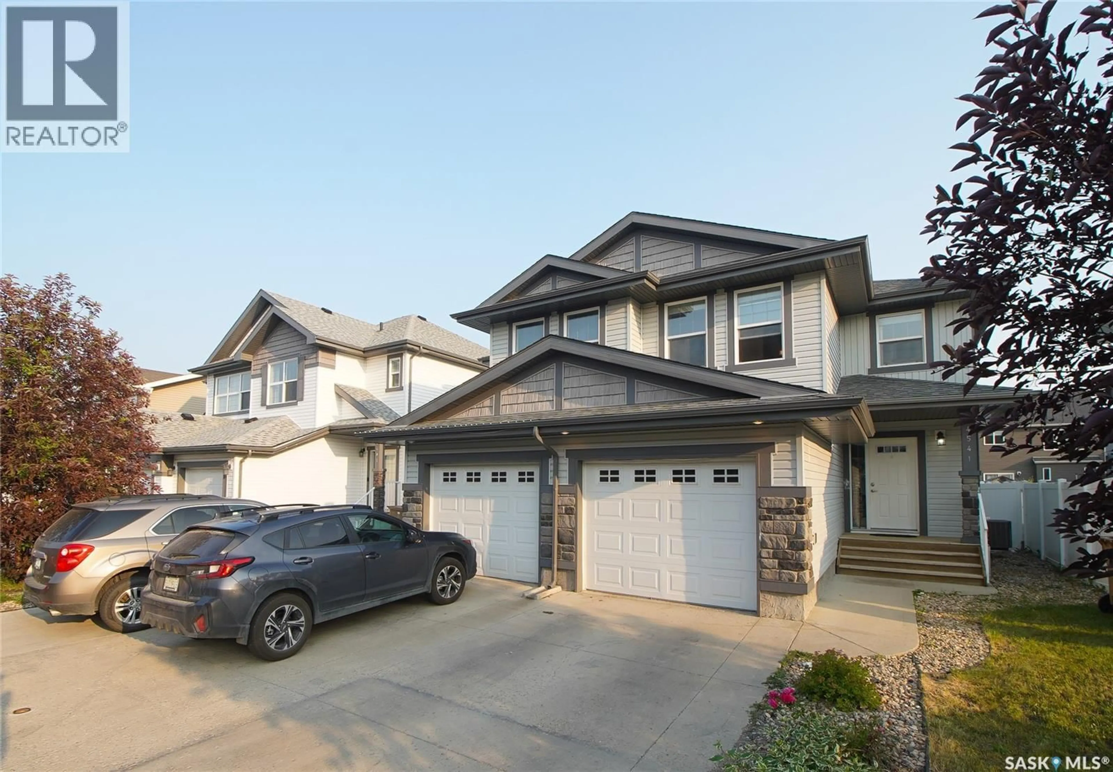 A pic from outside/outdoor area/front of a property/back of a property/a pic from drone, street for 4541 GREEN ROCK ROAD, Regina Saskatchewan S4V3K8