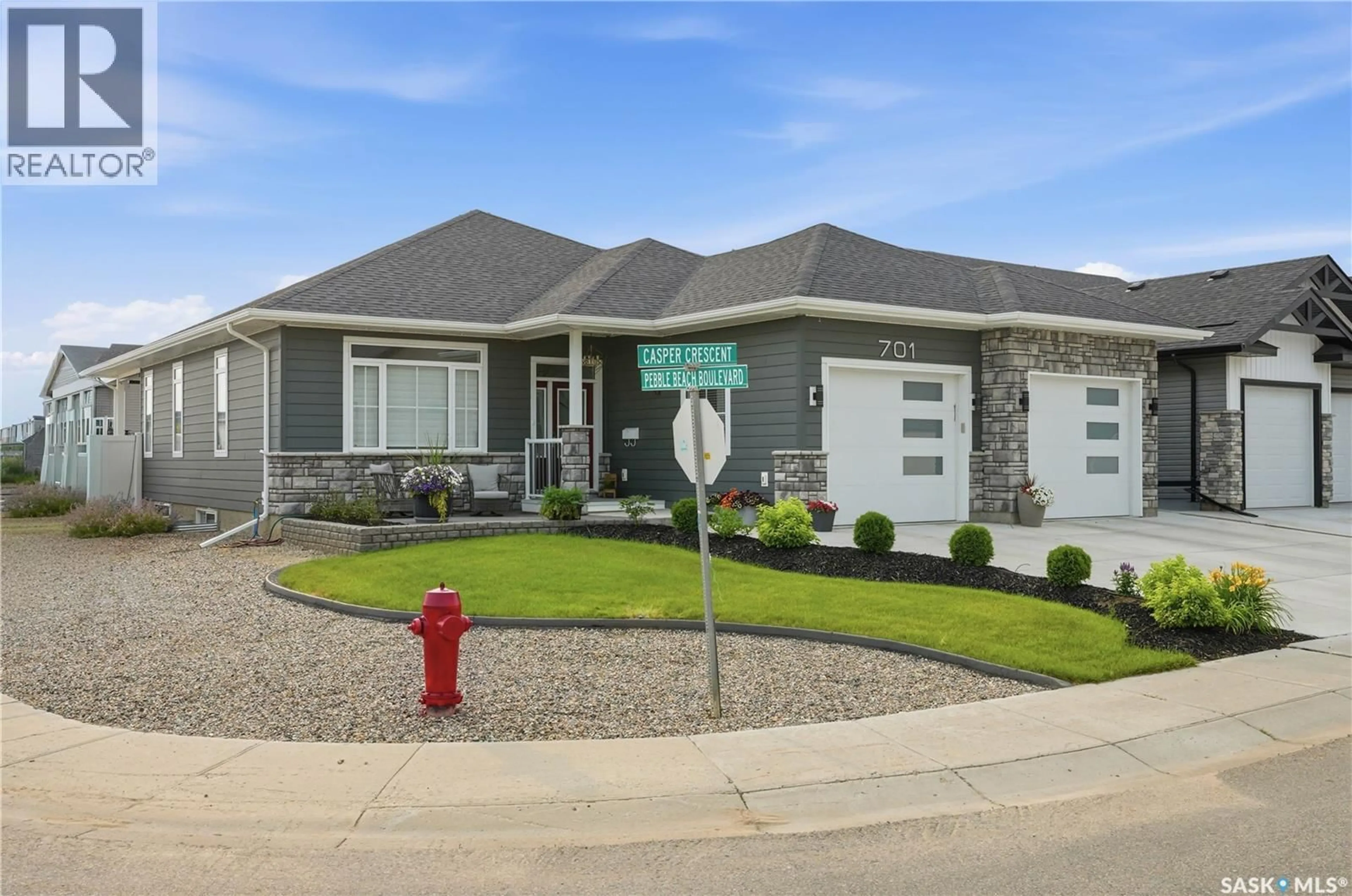 Home with vinyl exterior material, street for 701 CASPER CRESCENT, Warman Saskatchewan S0K4S4