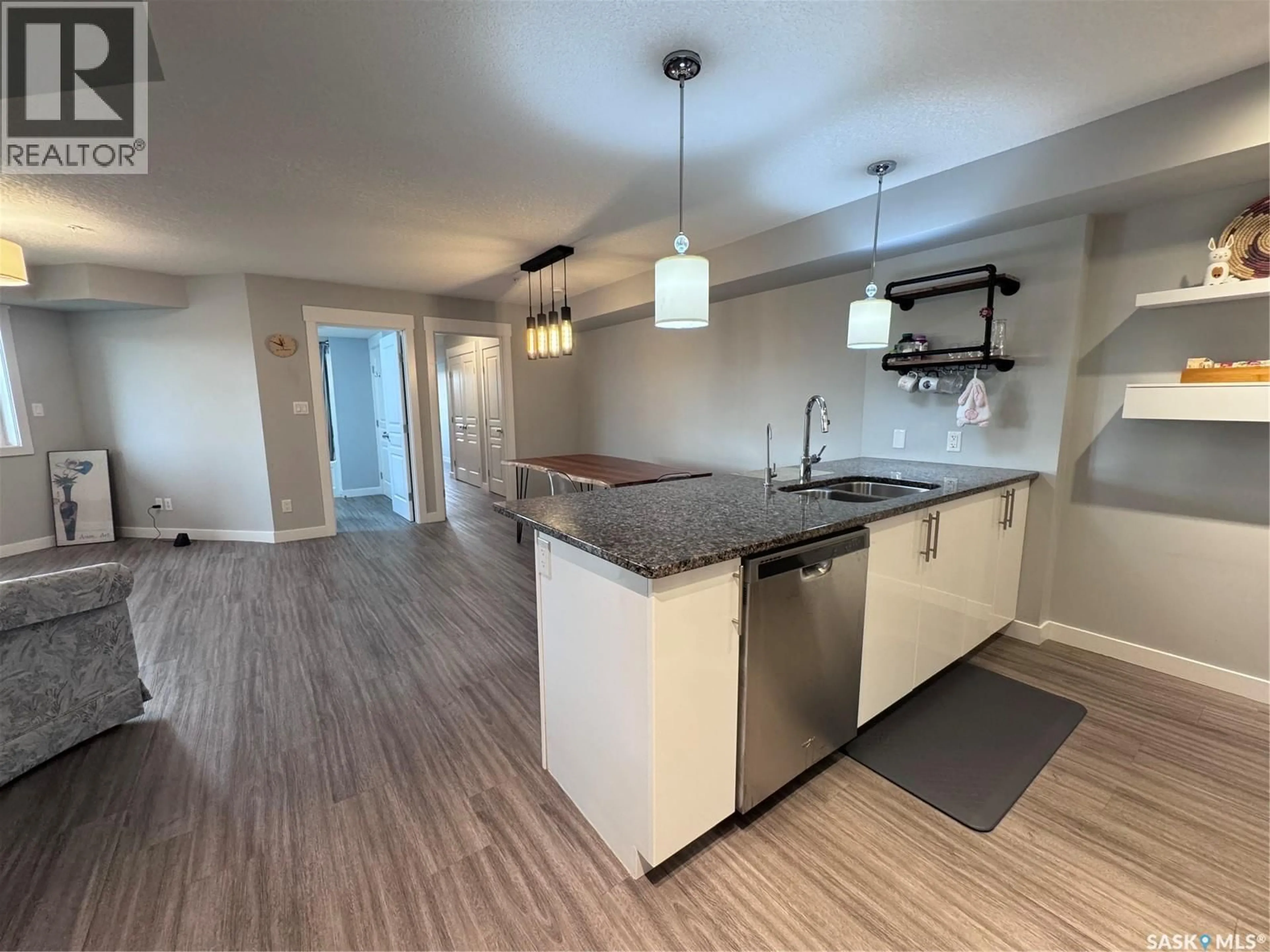 Open concept kitchen, unknown for 212 5301 UNIVERSAL CRESCENT, Regina Saskatchewan S4W0L2