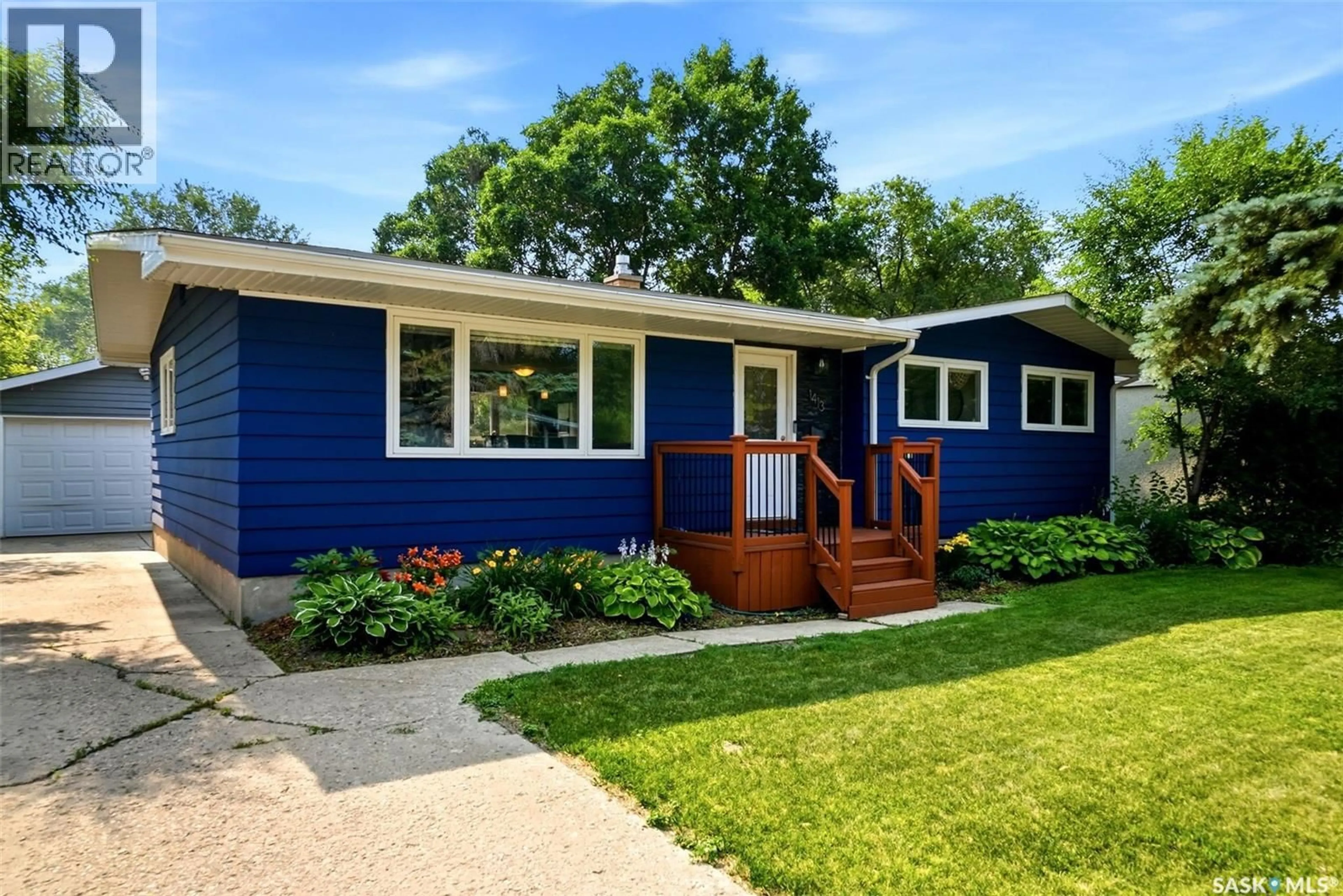 Home with vinyl exterior material, street for 1413 SHANNON ROAD, Regina Saskatchewan S4S5L4