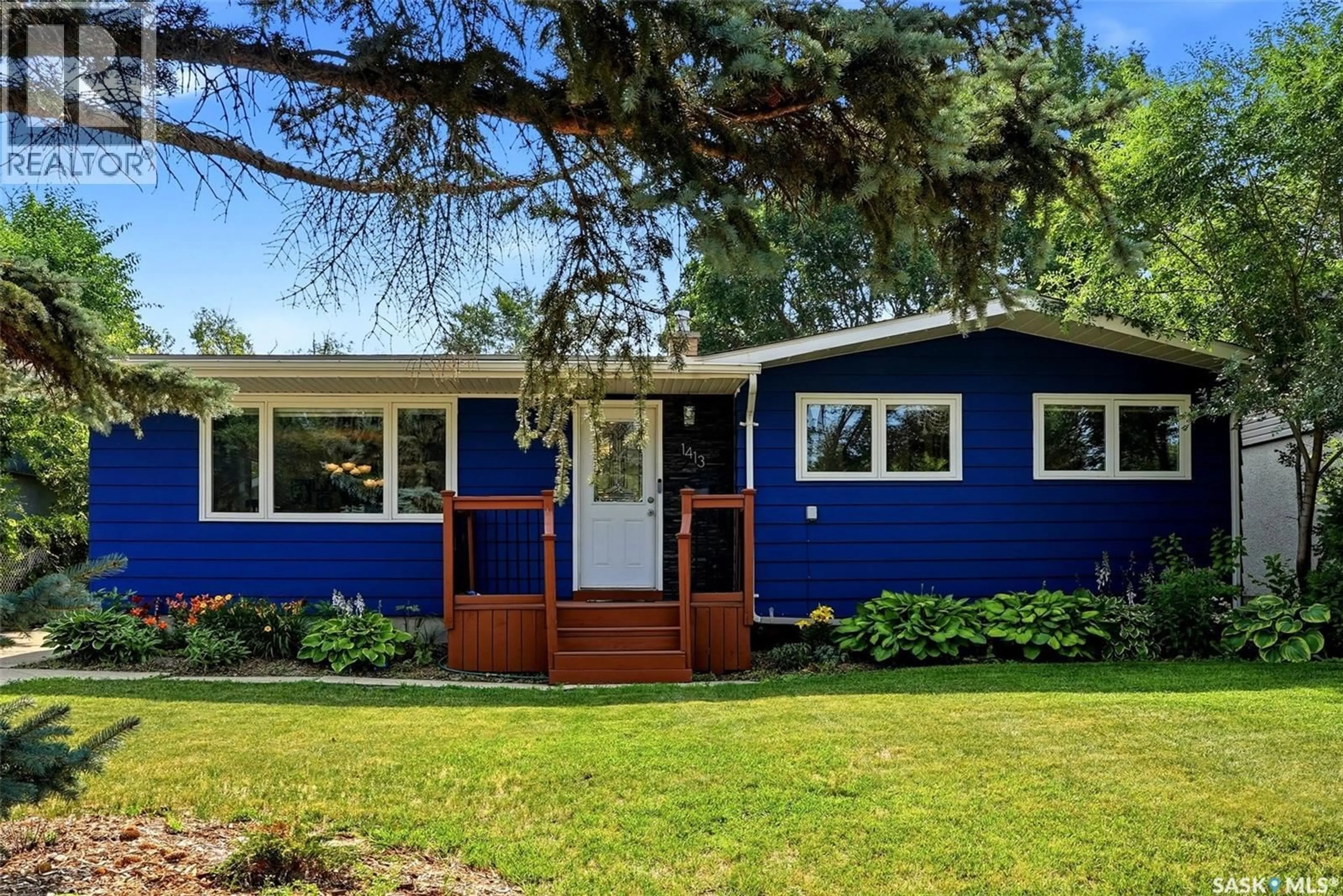 Home with vinyl exterior material, street for 1413 SHANNON ROAD, Regina Saskatchewan S4S5L4
