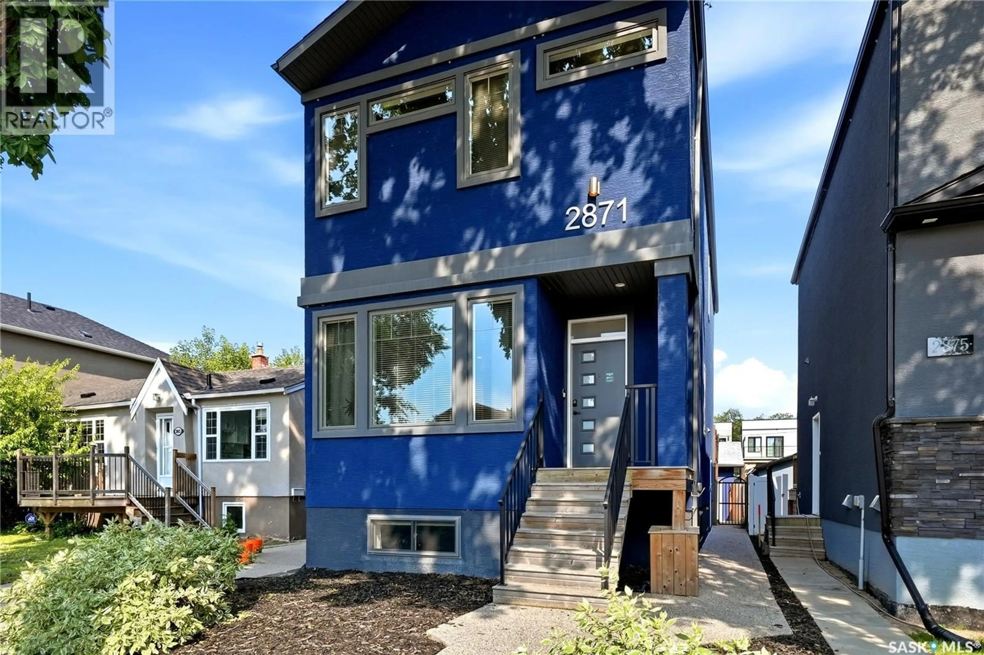 Home with vinyl exterior material, street for 2871 GARNET STREET, Regina Saskatchewan S4S1X1