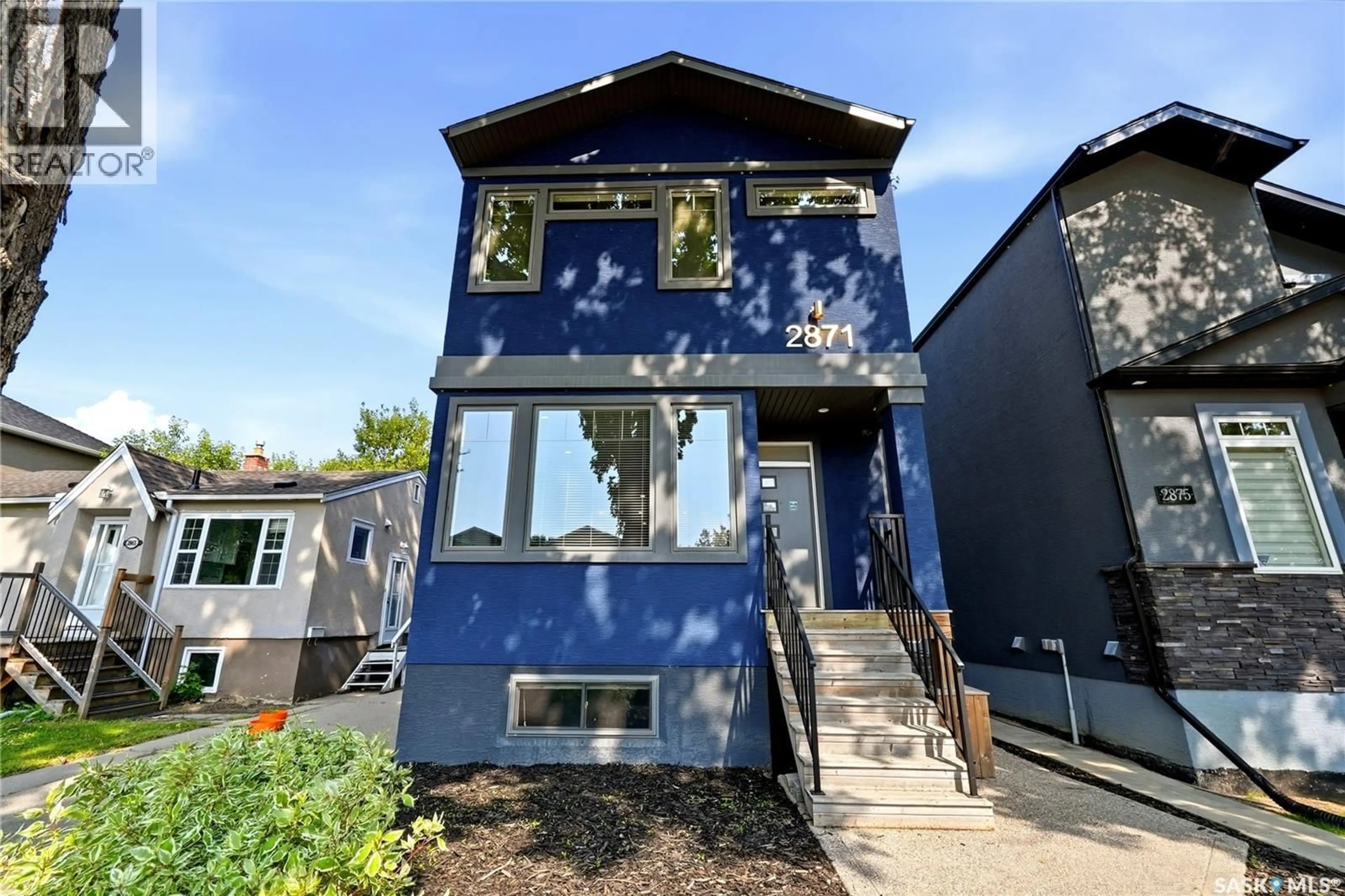 Home with vinyl exterior material, street for 2871 GARNET STREET, Regina Saskatchewan S4S1X1