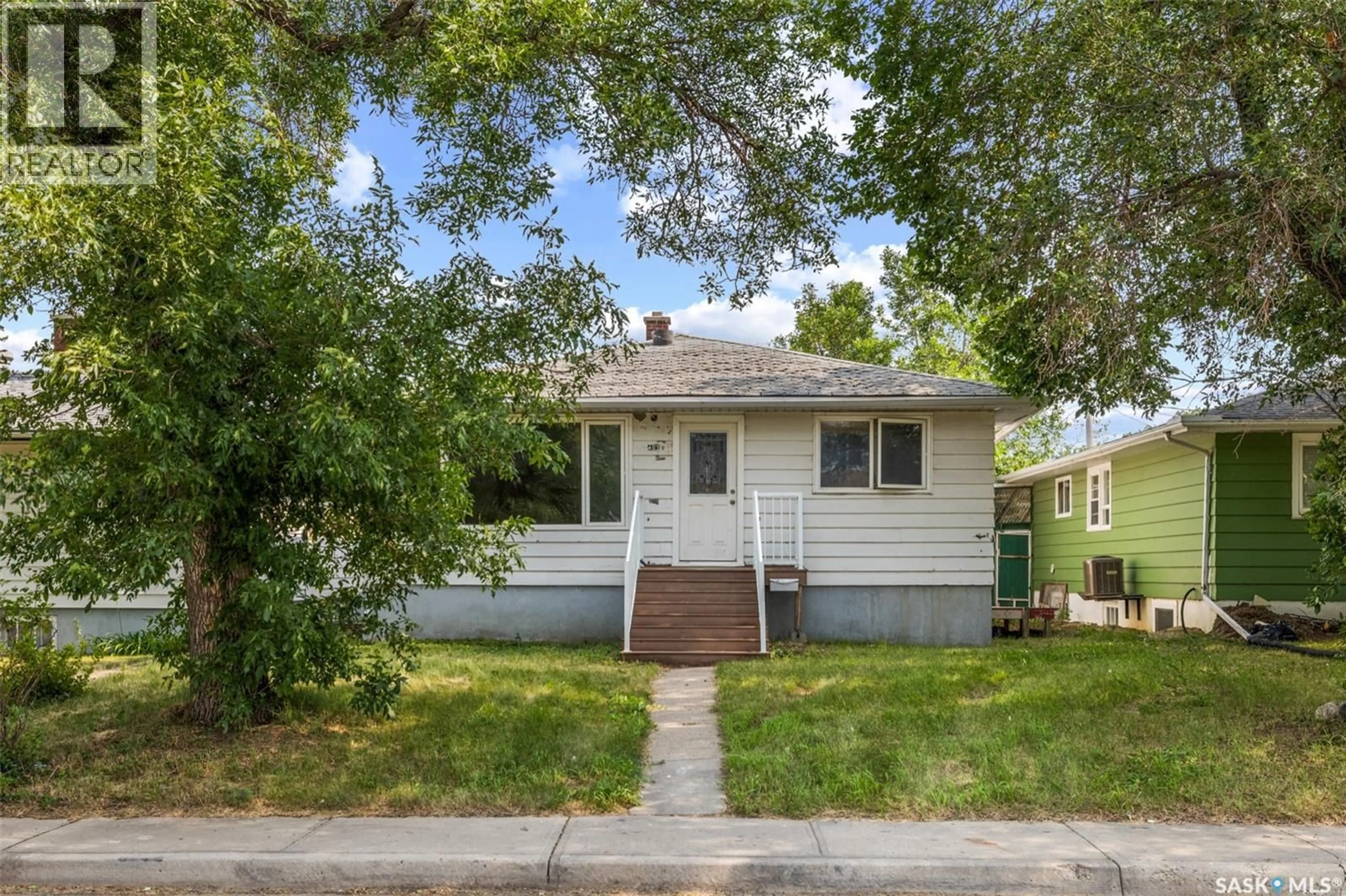 Home with vinyl exterior material, street for 403 17TH AVENUE, Regina Saskatchewan S4N0Y4
