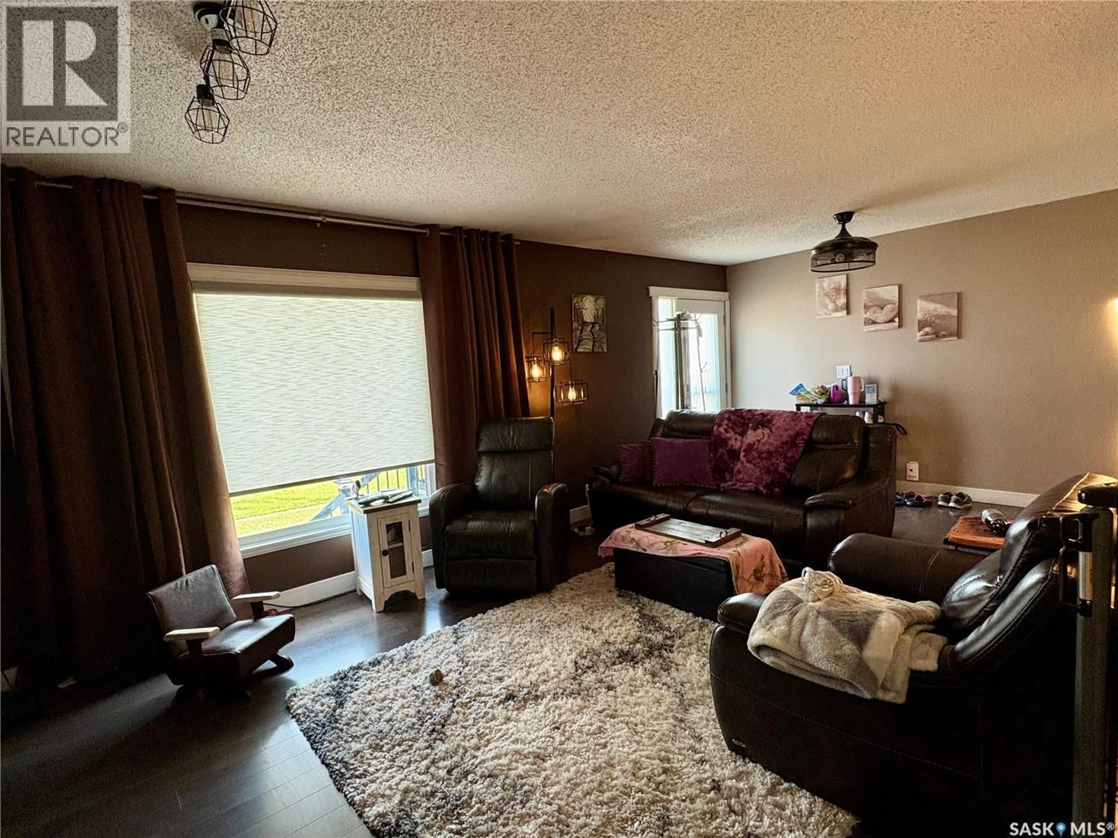 Living room with furniture, unknown for 105 5TH AVENUE, Hodgeville Saskatchewan S0H2B0