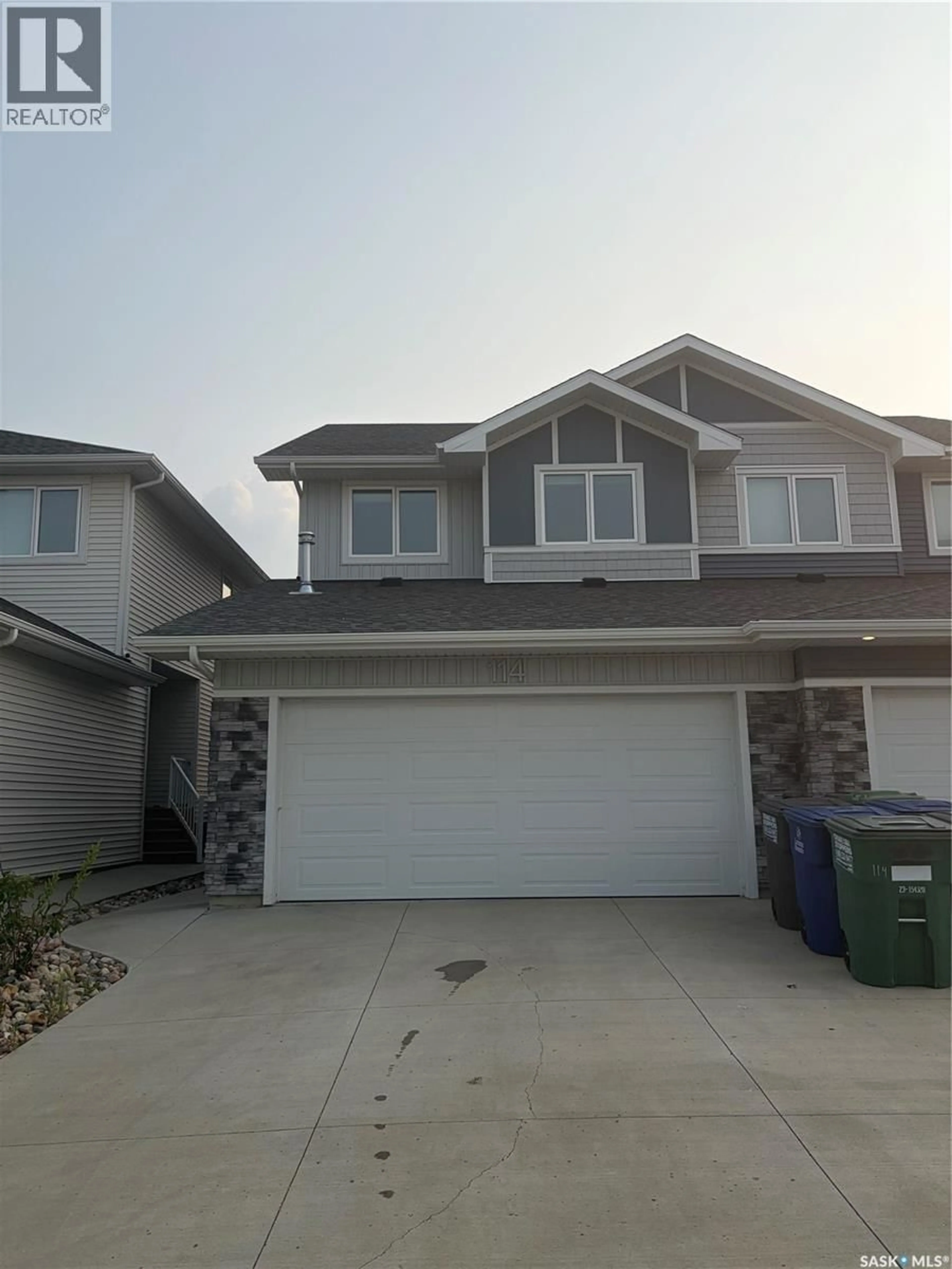 Home with vinyl exterior material, street for 114 COWESSESS ROAD, Saskatoon Saskatchewan S7V1S3