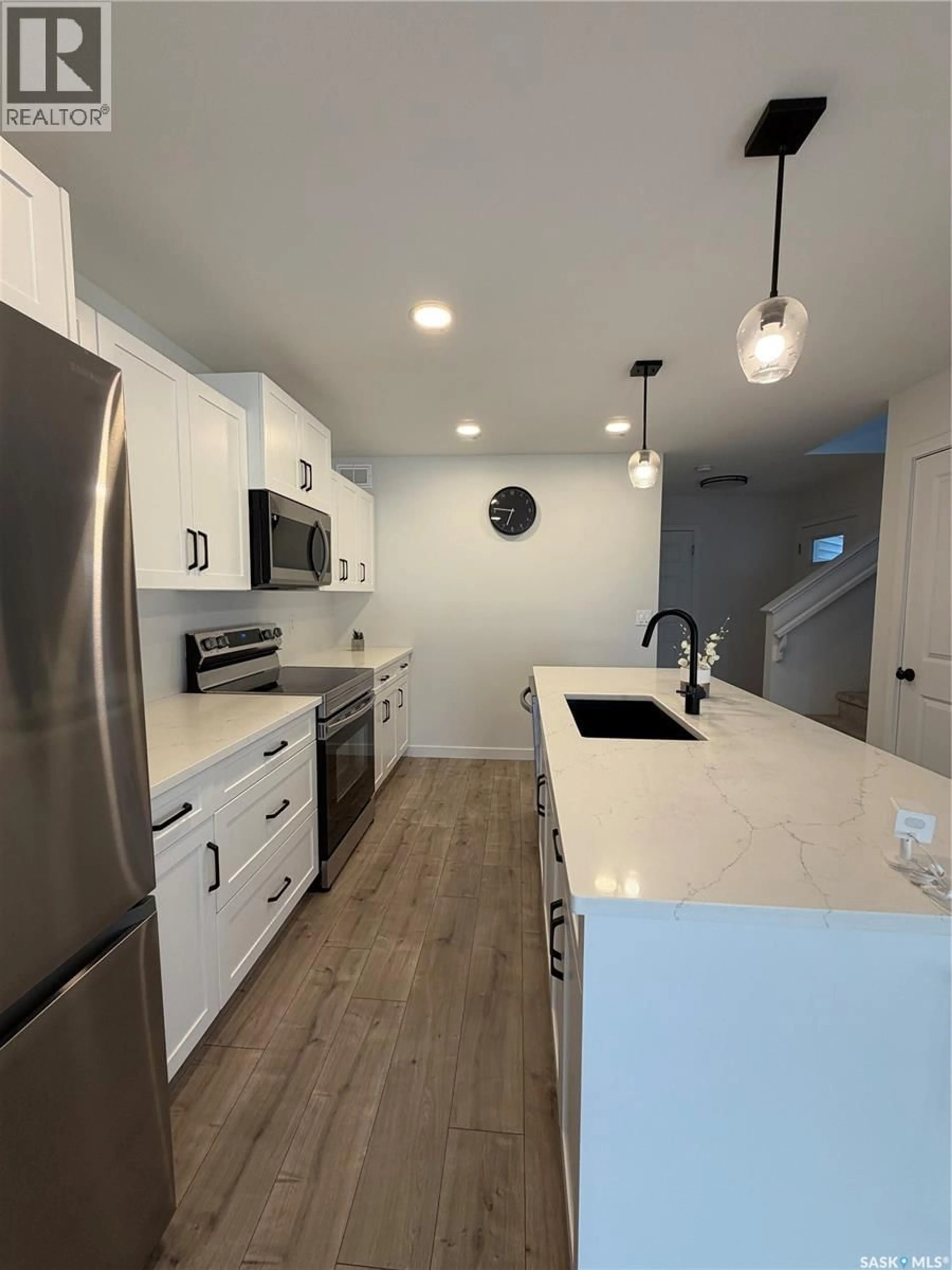 Open concept kitchen, unknown for 114 COWESSESS ROAD, Saskatoon Saskatchewan S7V1S3