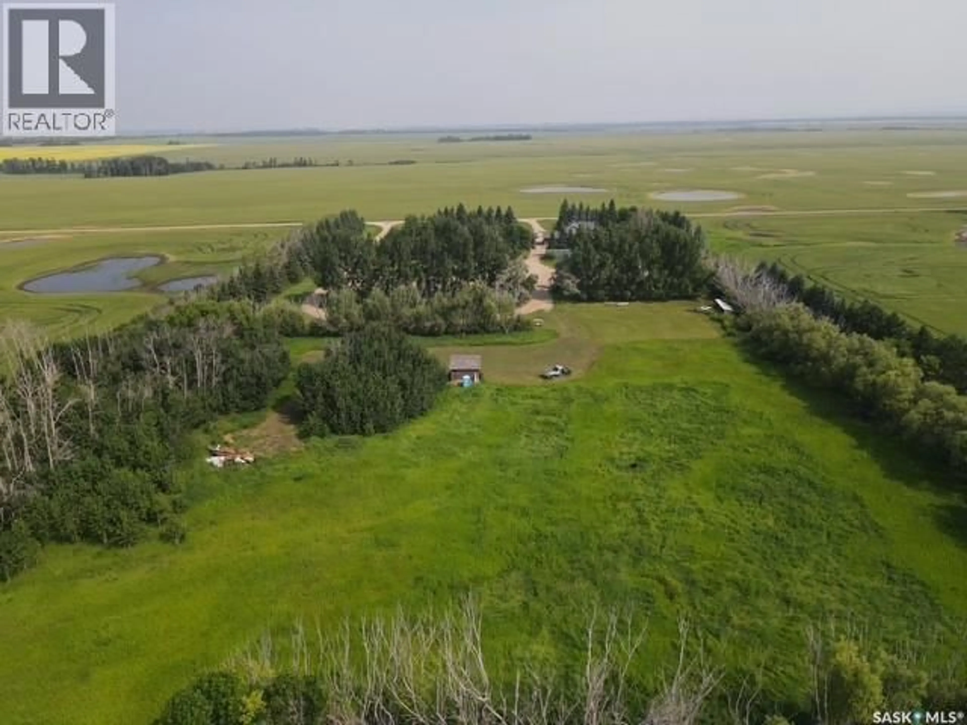 A pic from outside/outdoor area/front of a property/back of a property/a pic from drone, water/lake/river/ocean view for 6 30 32W1, Kamsack Saskatchewan S0A1S0