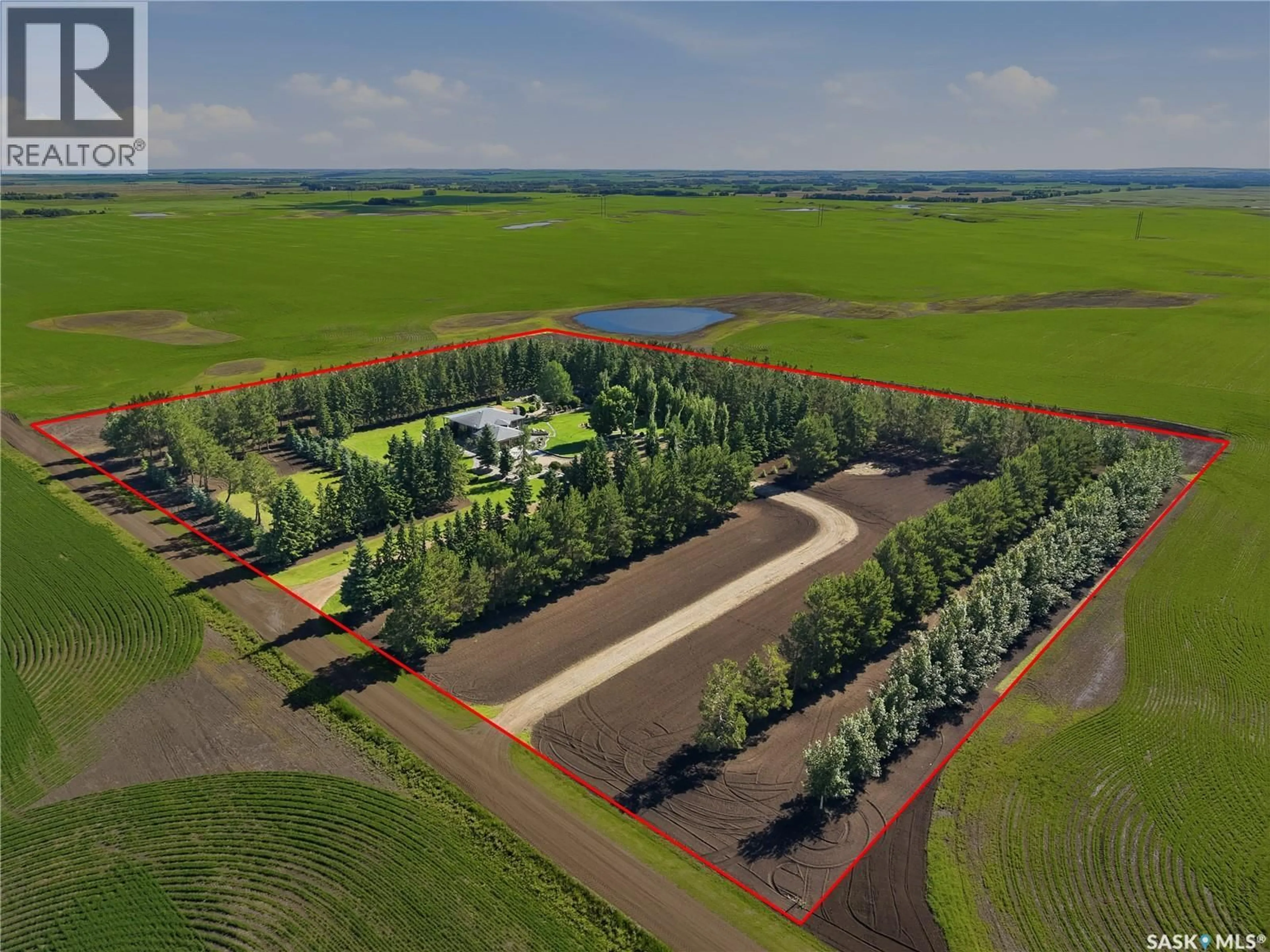 A pic from outside/outdoor area/front of a property/back of a property/a pic from drone, forest/trees view for HEIDEL ACREAGE, North Battleford Rm No. 437 Saskatchewan S9A3W2