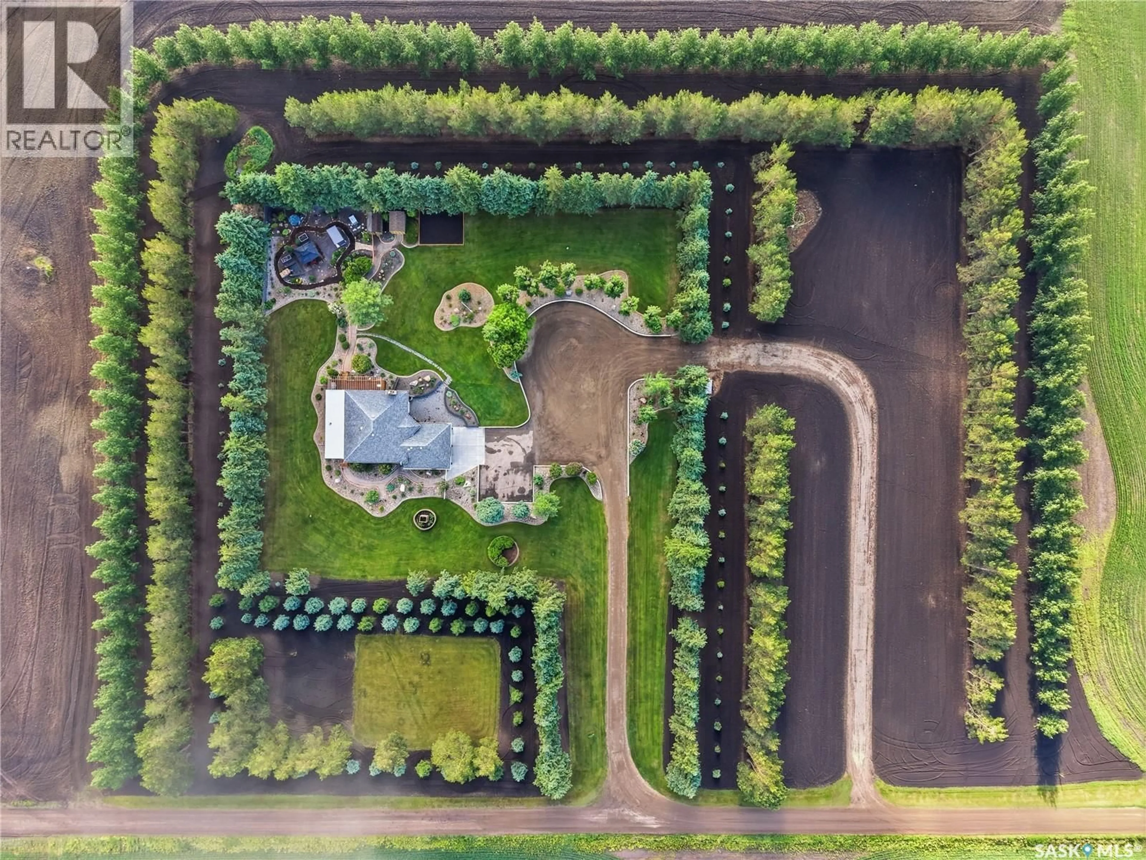 A pic from outside/outdoor area/front of a property/back of a property/a pic from drone, unknown for HEIDEL ACREAGE, North Battleford Rm No. 437 Saskatchewan S9A3W2