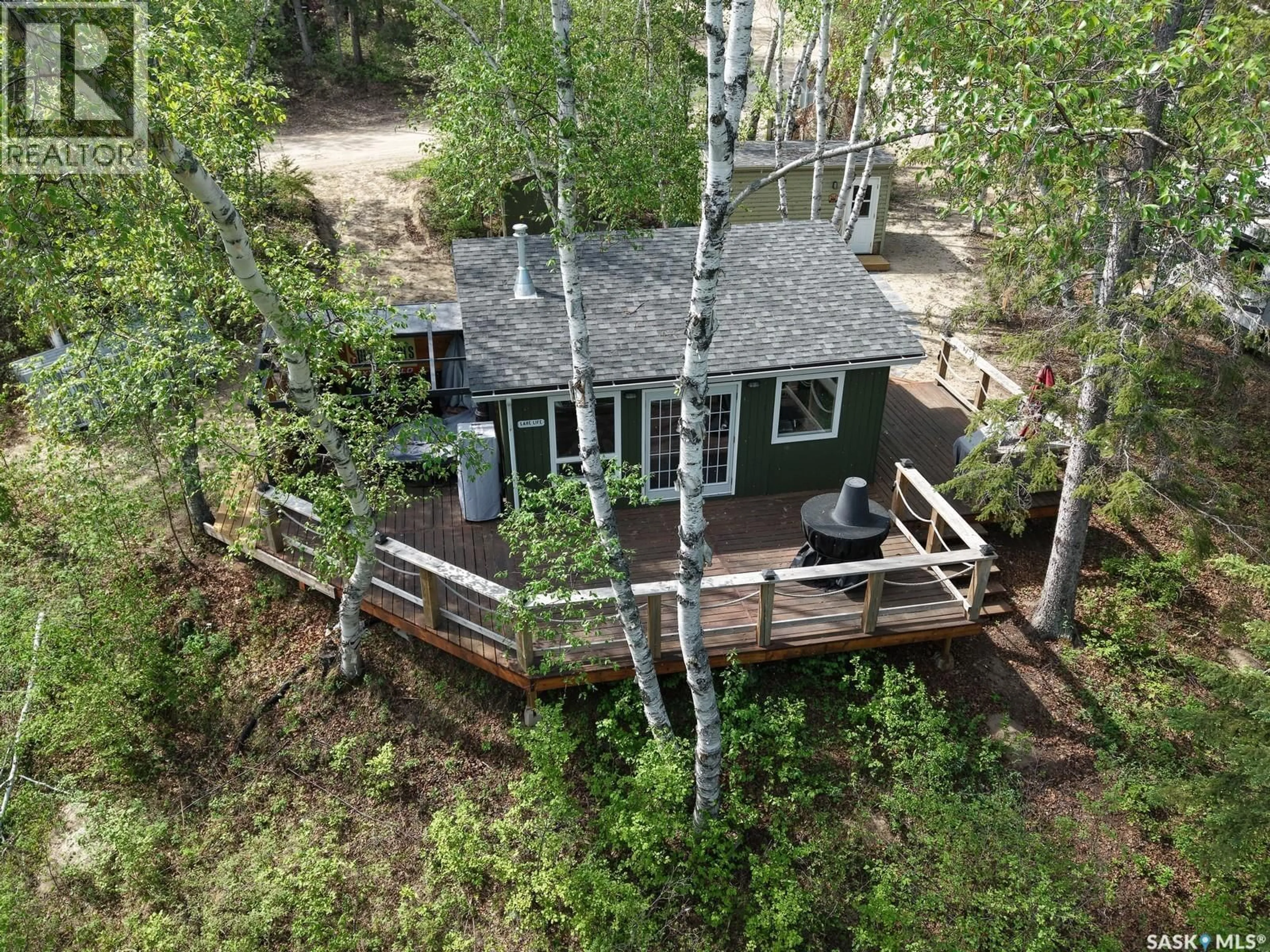 A pic from outside/outdoor area/front of a property/back of a property/a pic from drone, forest/trees view for 1 BIRCH PLACE, Tobin Lake Saskatchewan S0E1E0