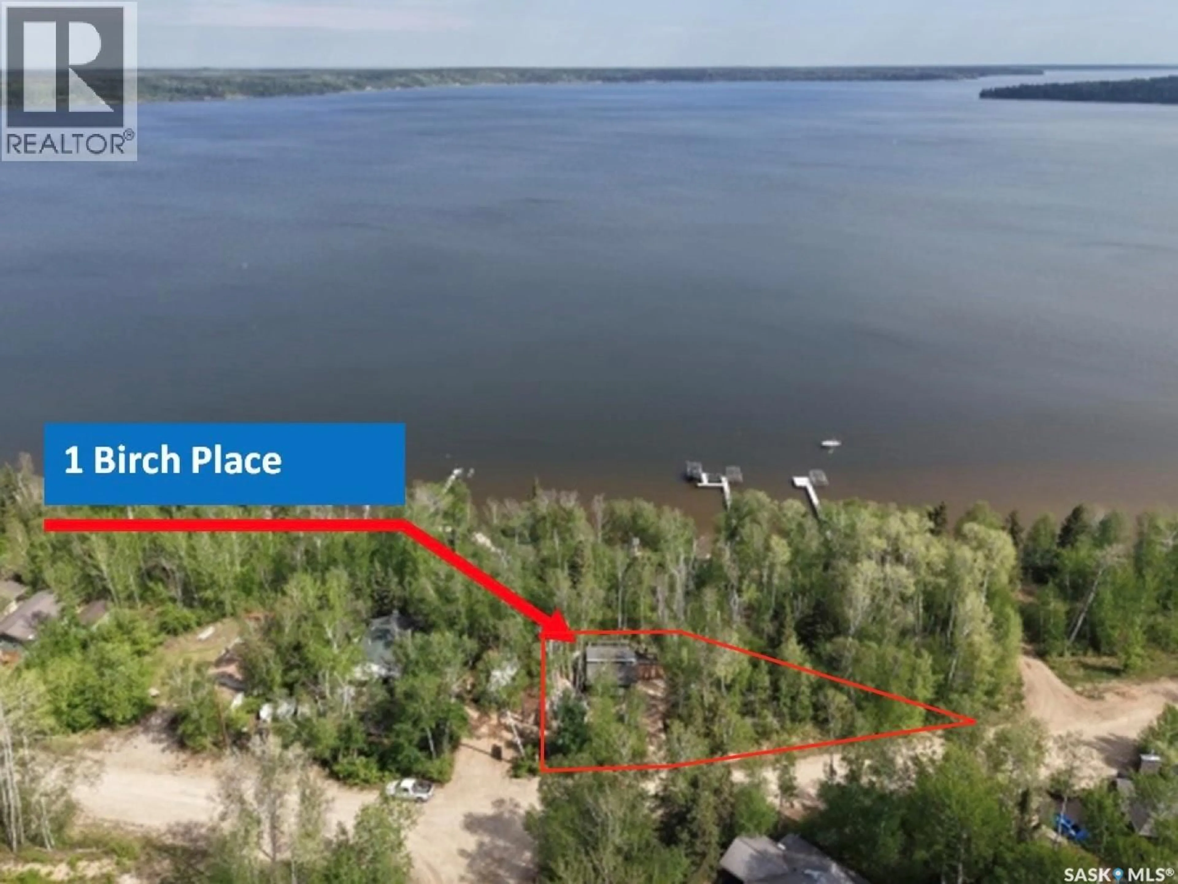 A pic from outside/outdoor area/front of a property/back of a property/a pic from drone, water/lake/river/ocean view for 1 BIRCH PLACE, Tobin Lake Saskatchewan S0E1E0