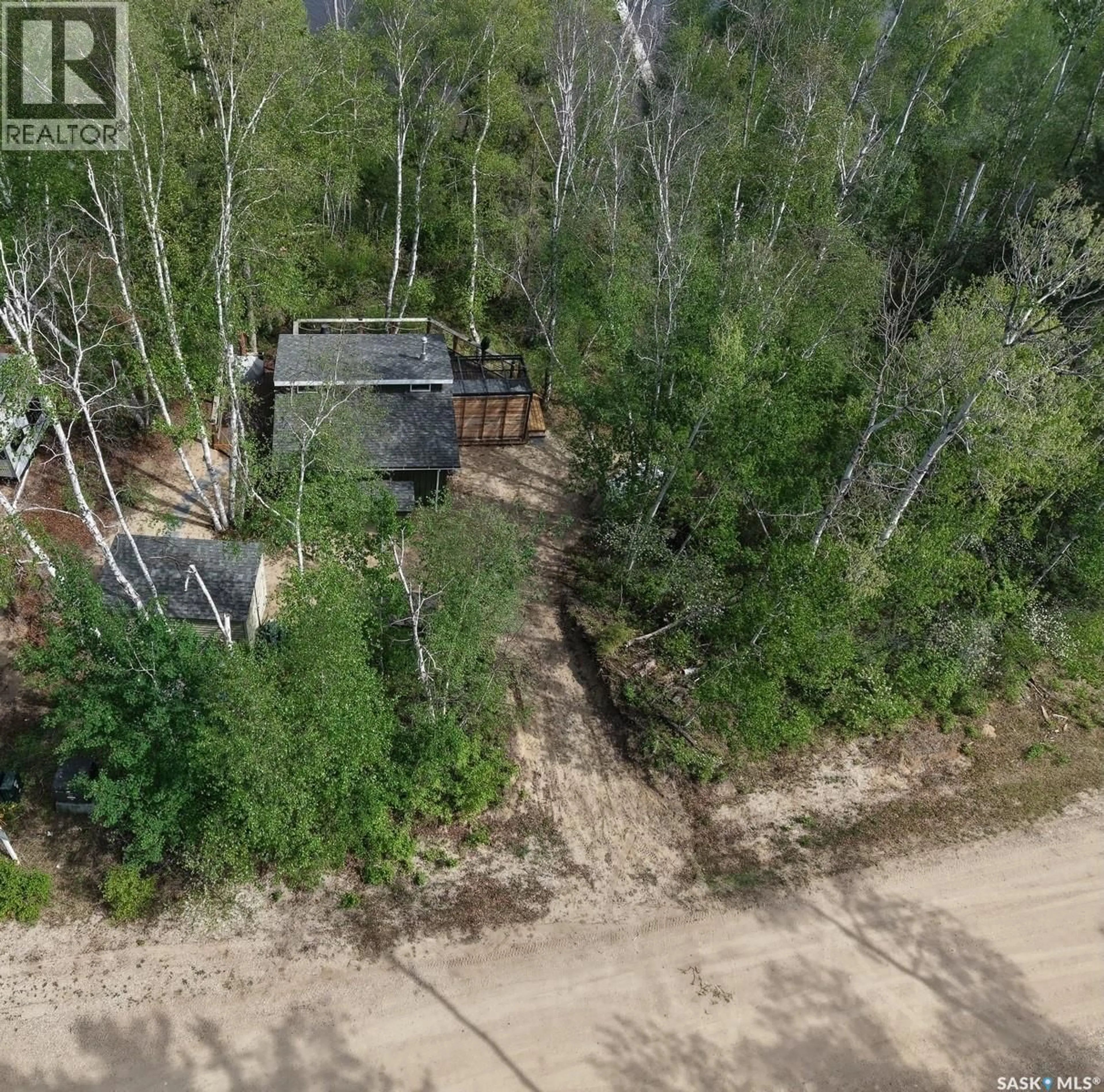 A pic from outside/outdoor area/front of a property/back of a property/a pic from drone, forest/trees view for 1 BIRCH PLACE, Tobin Lake Saskatchewan S0E1E0