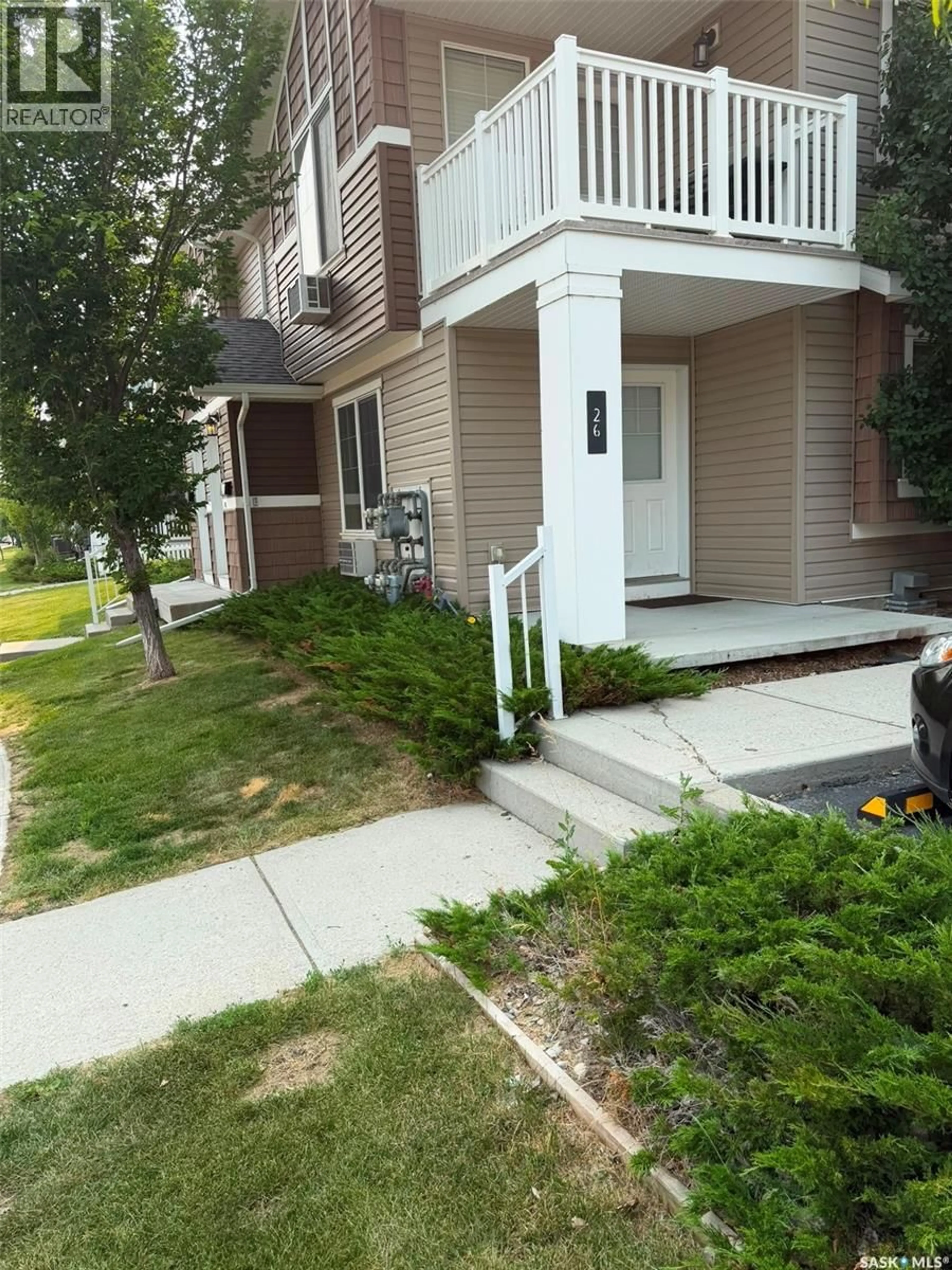 Home with vinyl exterior material, street for 26 - 5742 GORDON ROAD, Regina Saskatchewan S4W0M1