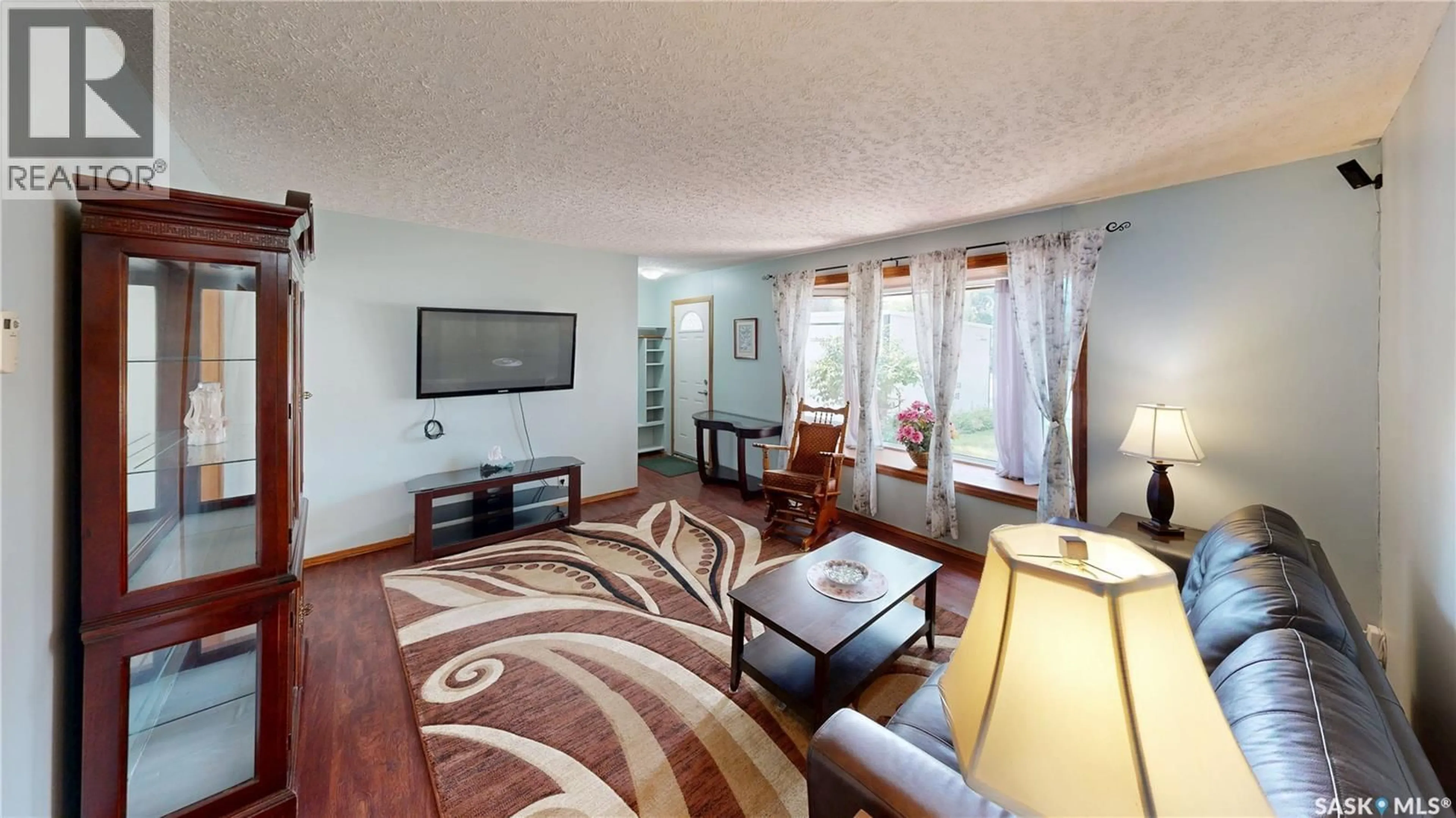 Living room with furniture, unknown for 611 MCINTOSH STREET, Regina Saskatchewan S4T5B3