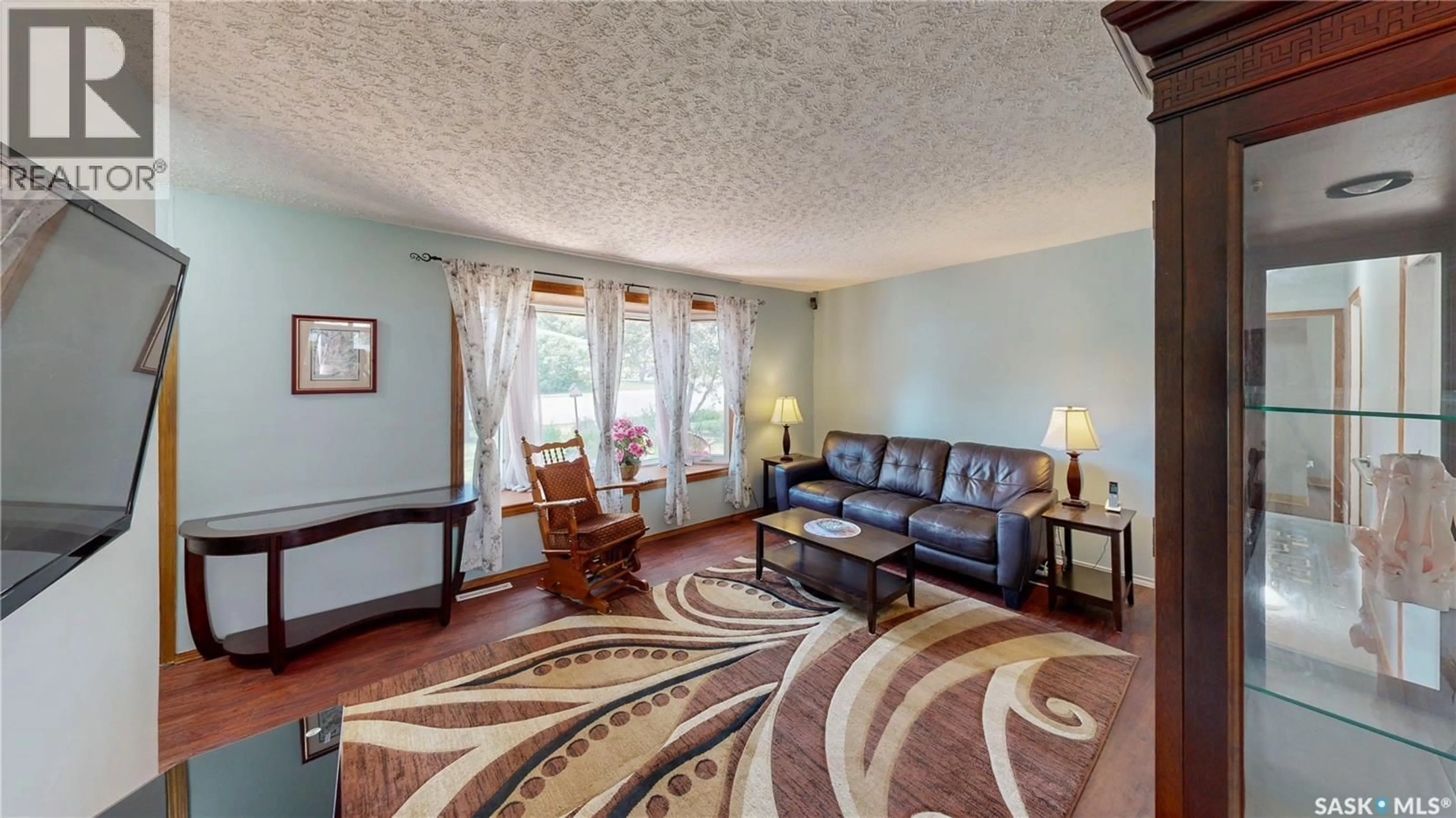 Living room with furniture, unknown for 611 MCINTOSH STREET, Regina Saskatchewan S4T5B3