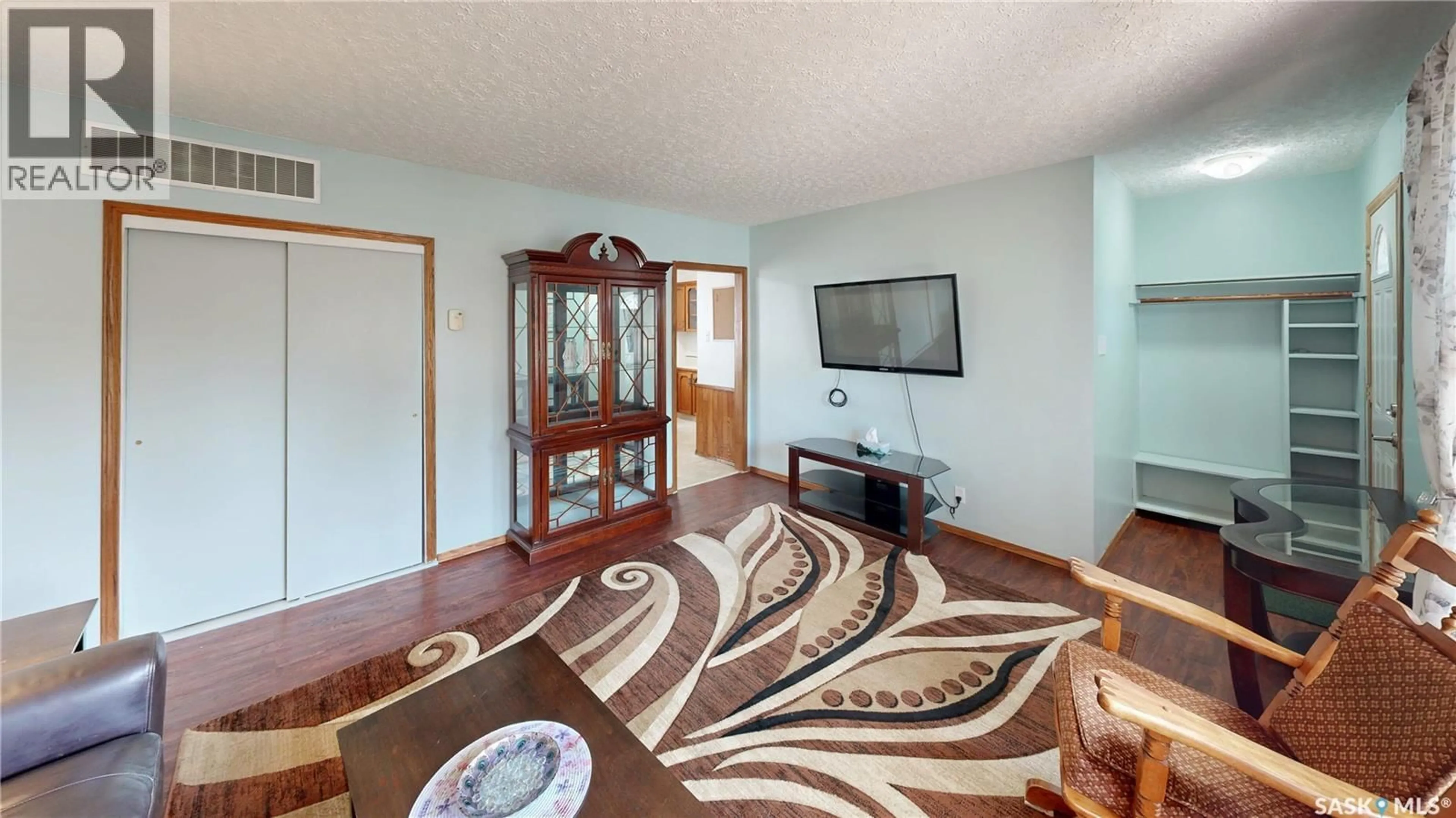 Living room with furniture, unknown for 611 MCINTOSH STREET, Regina Saskatchewan S4T5B3