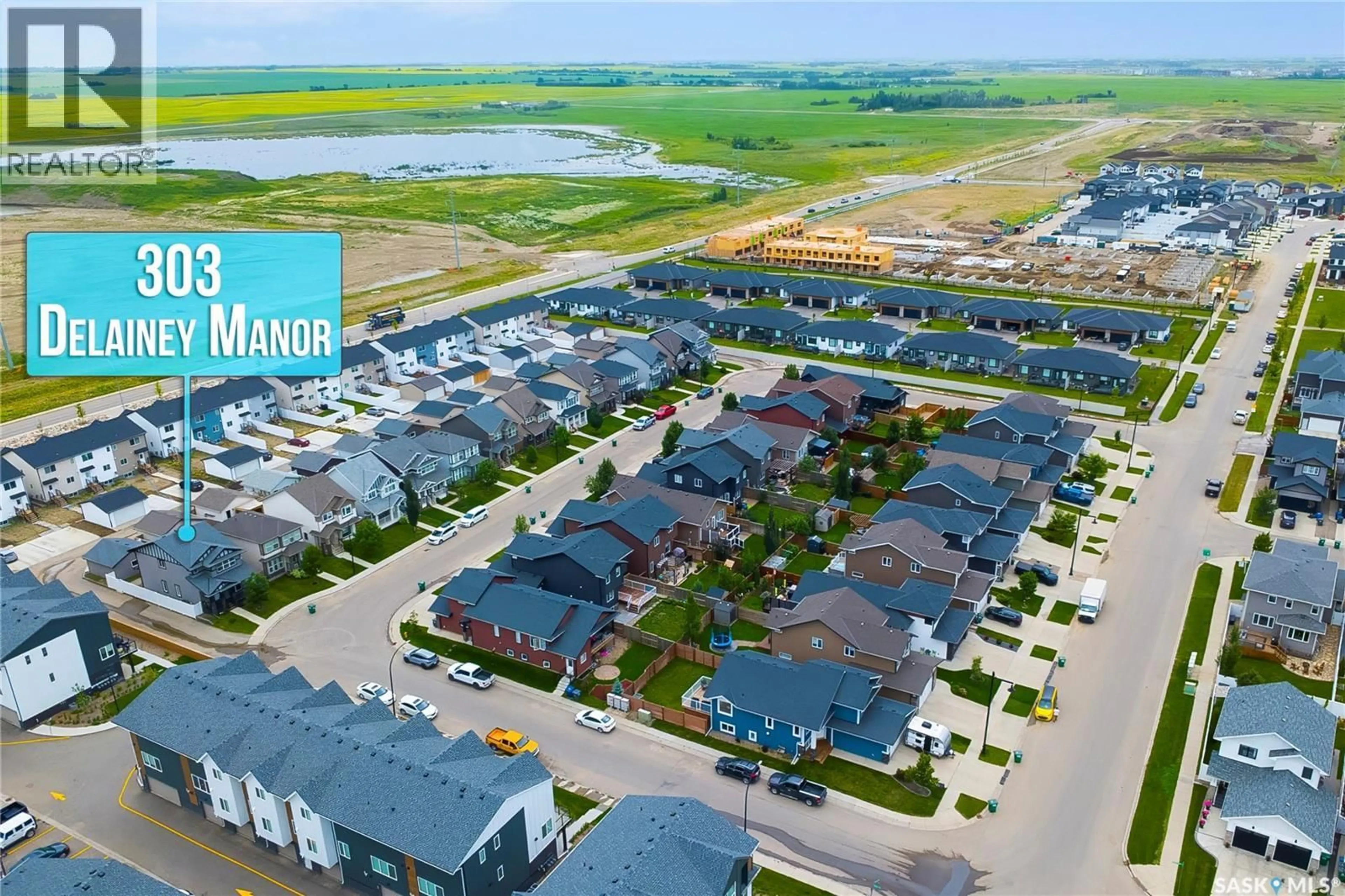 A pic from outside/outdoor area/front of a property/back of a property/a pic from drone, water/lake/river/ocean view for 303 DELAINEY MANOR, Saskatoon Saskatchewan S7V0N4