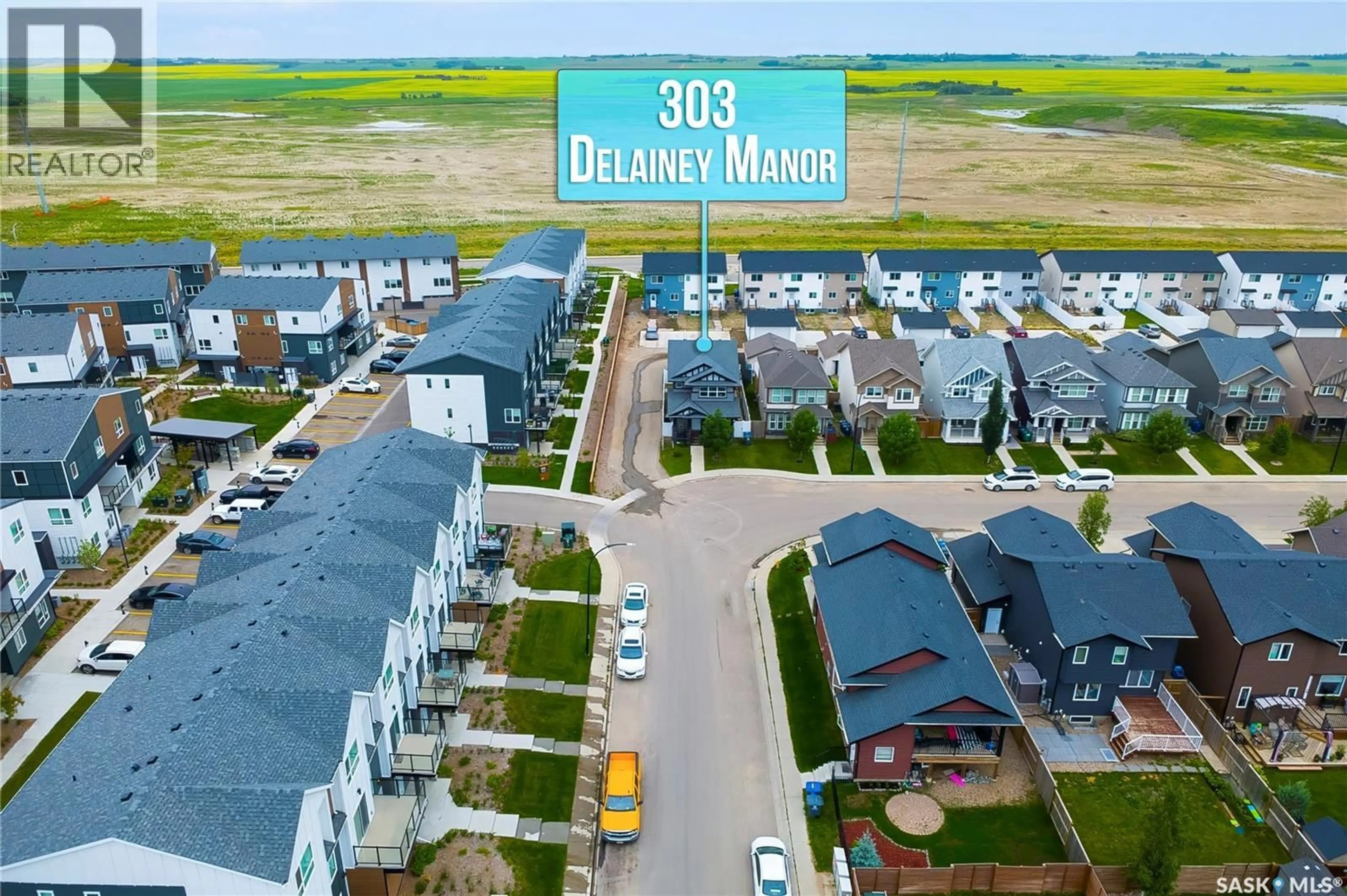 A pic from outside/outdoor area/front of a property/back of a property/a pic from drone, unknown for 303 DELAINEY MANOR, Saskatoon Saskatchewan S7V0N4