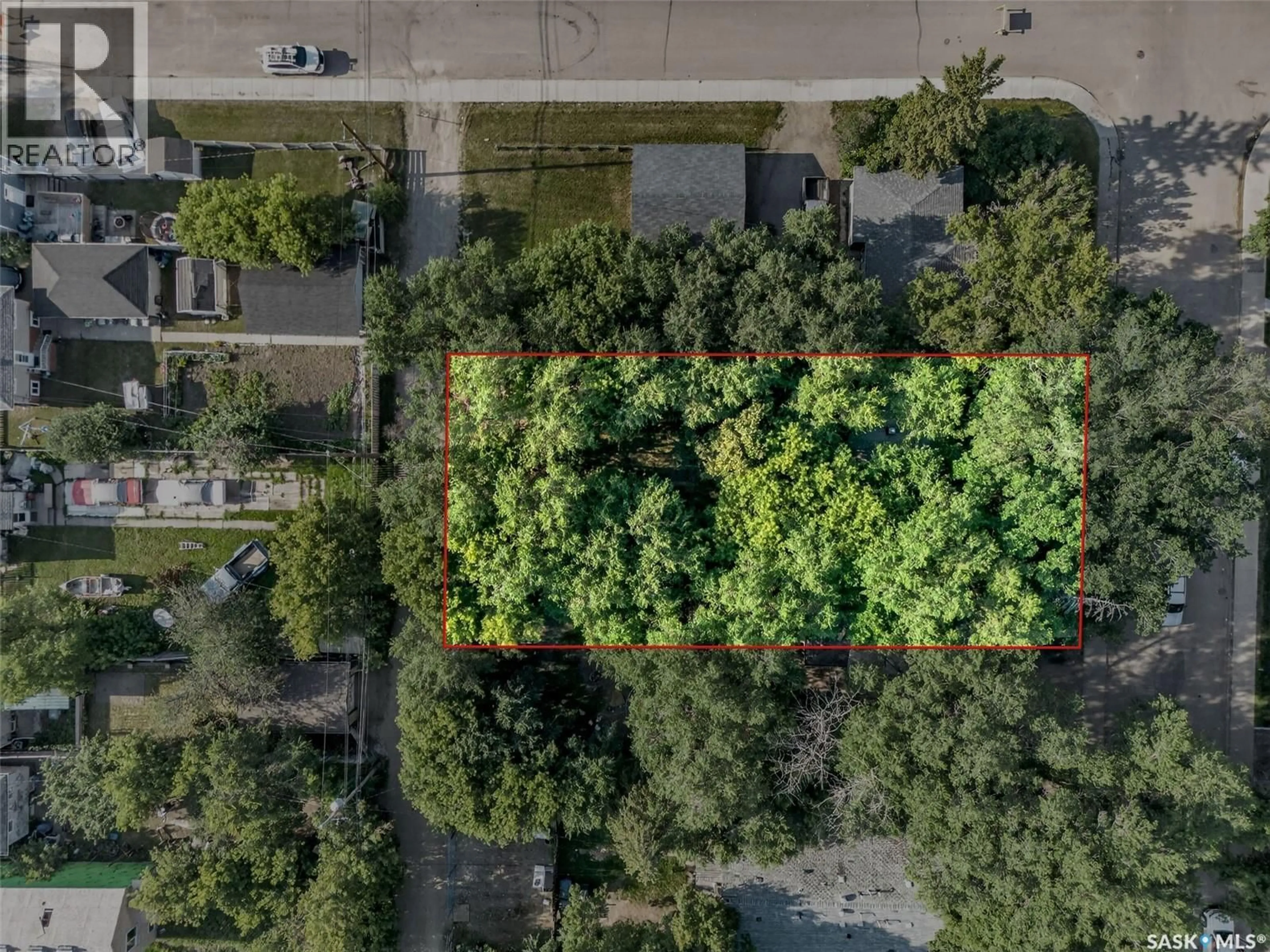 A pic from outside/outdoor area/front of a property/back of a property/a pic from drone, forest/trees view for 209 V AVENUE, Saskatoon Saskatchewan S7M3E2