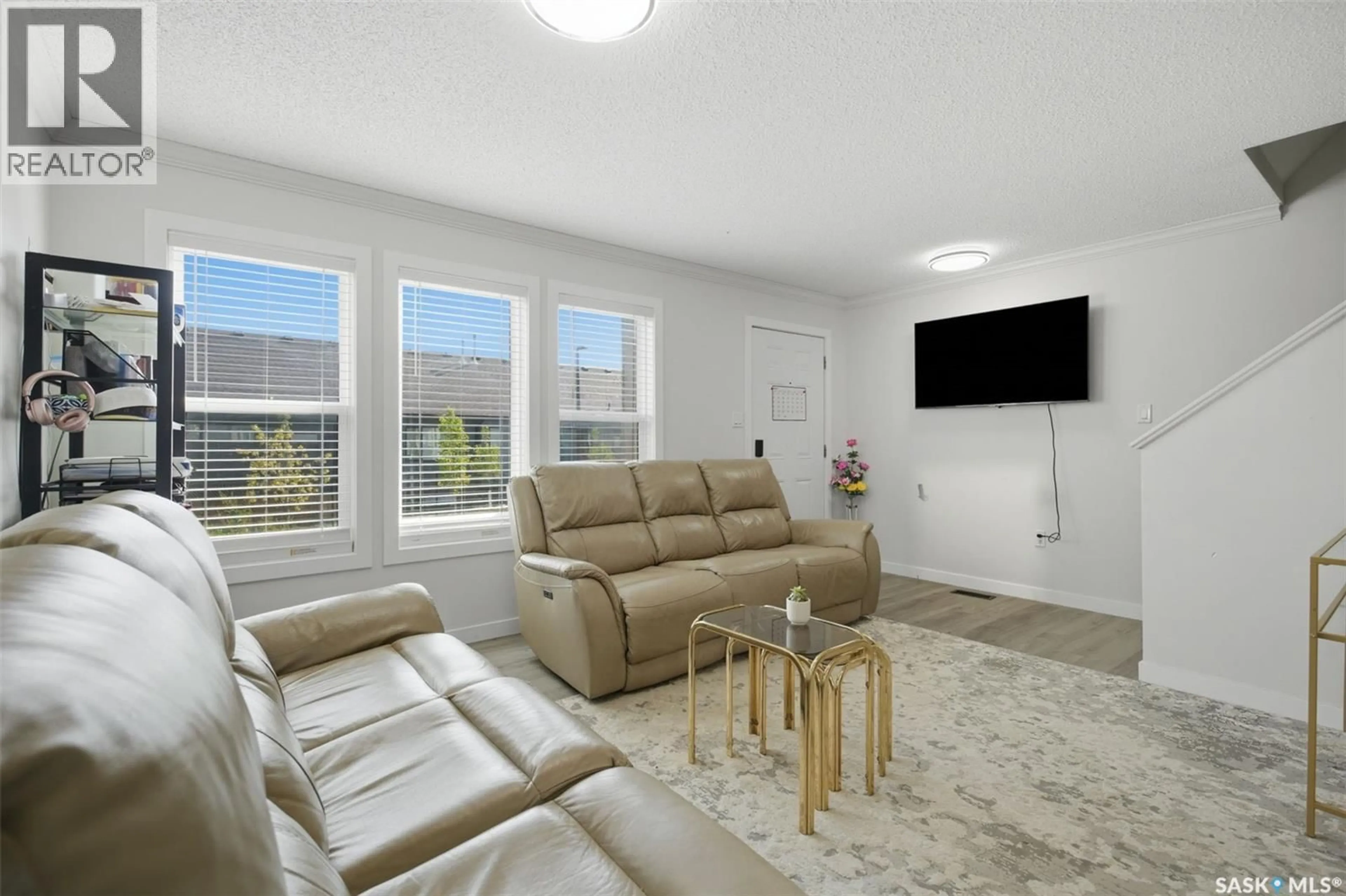 Living room with furniture, unknown for E - 70 235 ROSEWOOD BOULEVARD, Saskatoon Saskatchewan S7V0J3