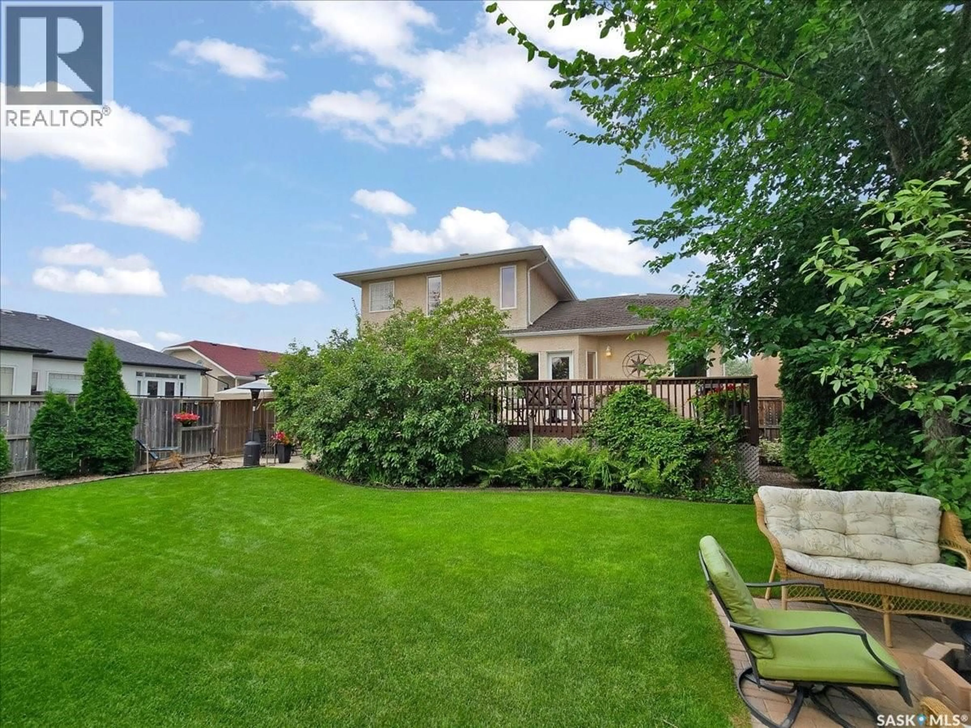 A pic from outside/outdoor area/front of a property/back of a property/a pic from drone, street for 211 BROOKSHIRE CRESCENT, Saskatoon Saskatchewan S7V1H1