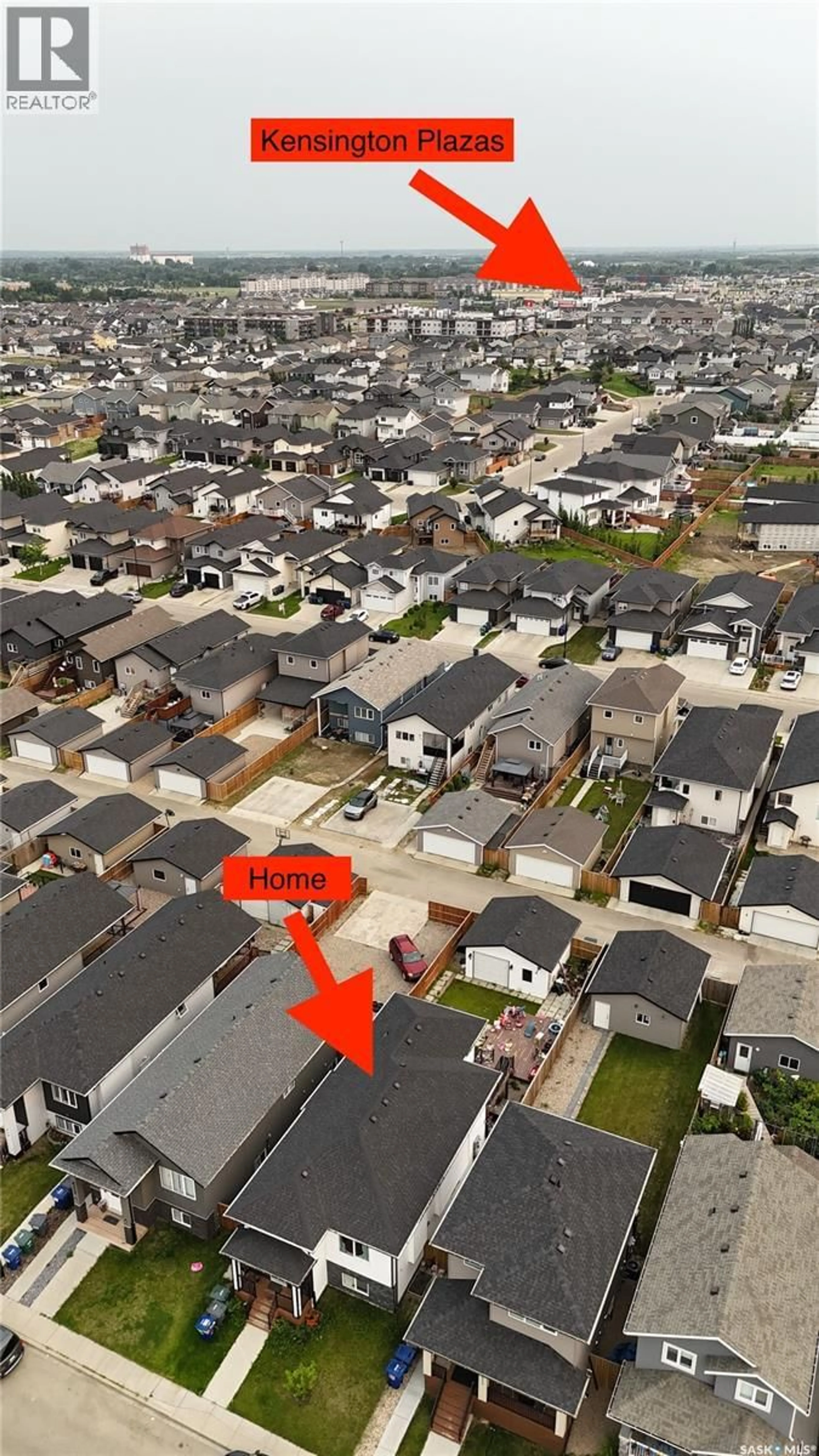 A pic from outside/outdoor area/front of a property/back of a property/a pic from drone, street for 418 ELLS WAY, Saskatoon Saskatchewan S7L6K6