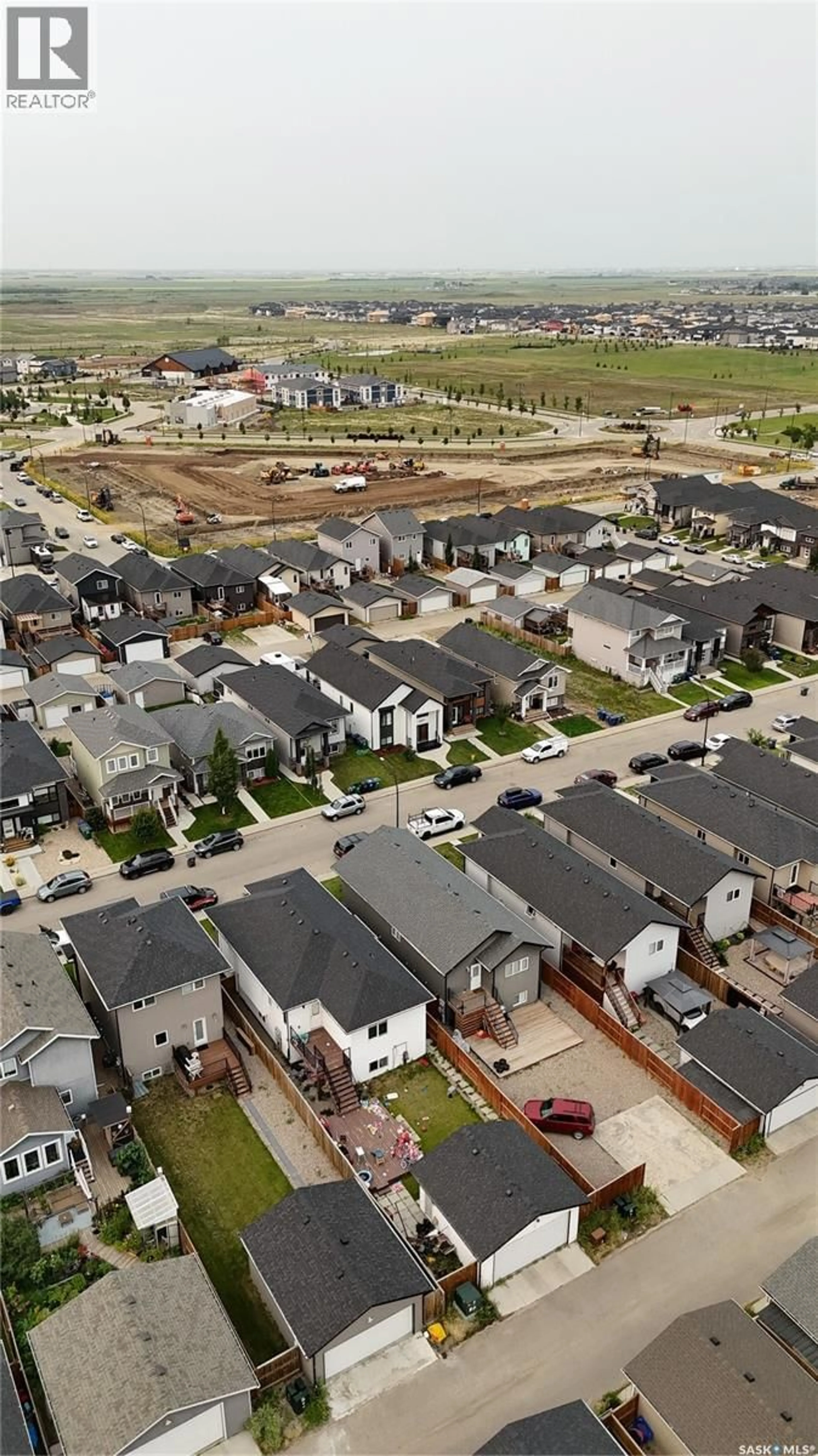 A pic from outside/outdoor area/front of a property/back of a property/a pic from drone, street for 418 ELLS WAY, Saskatoon Saskatchewan S7L6K6