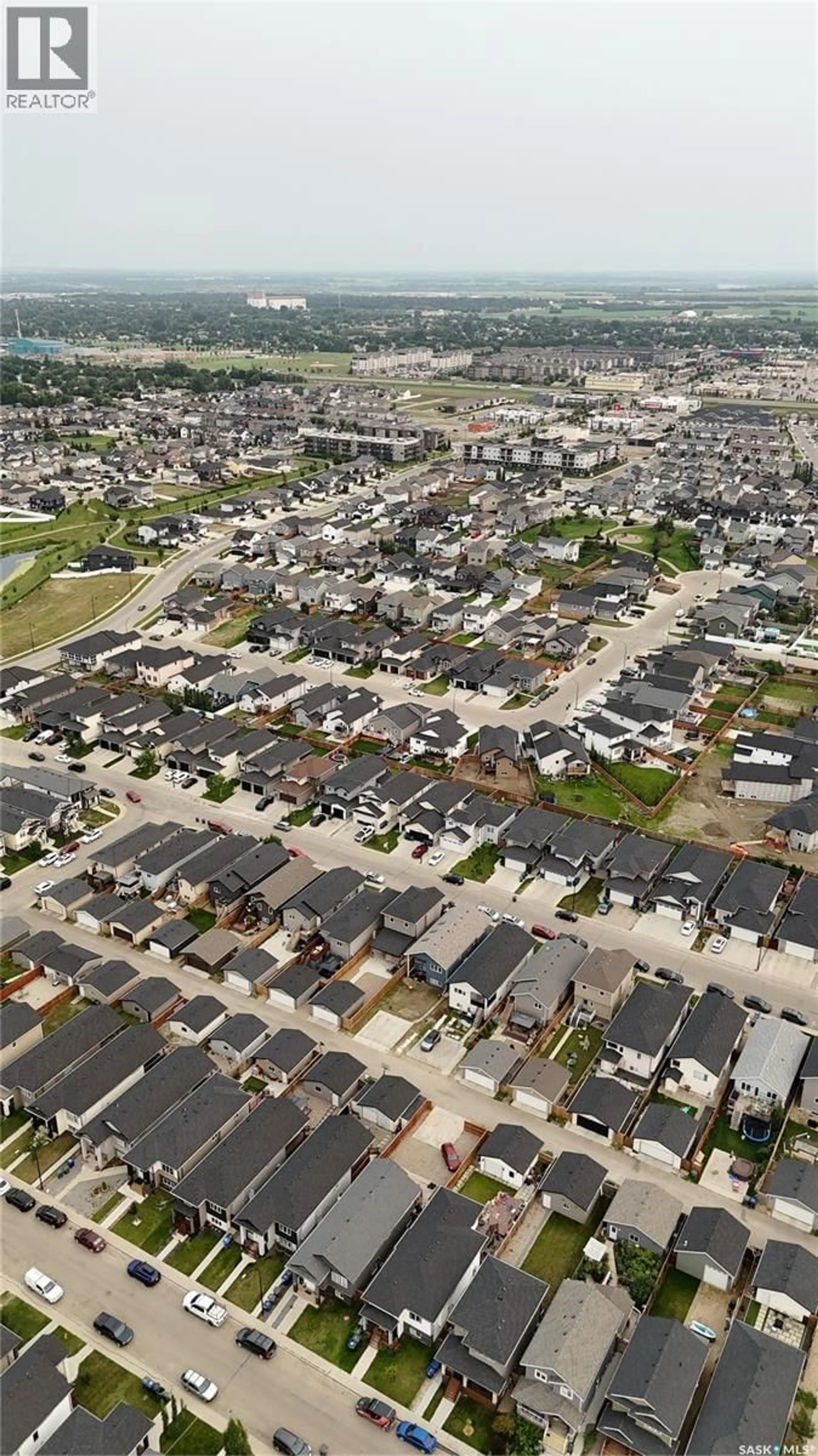 A pic from outside/outdoor area/front of a property/back of a property/a pic from drone, street for 418 ELLS WAY, Saskatoon Saskatchewan S7L6K6