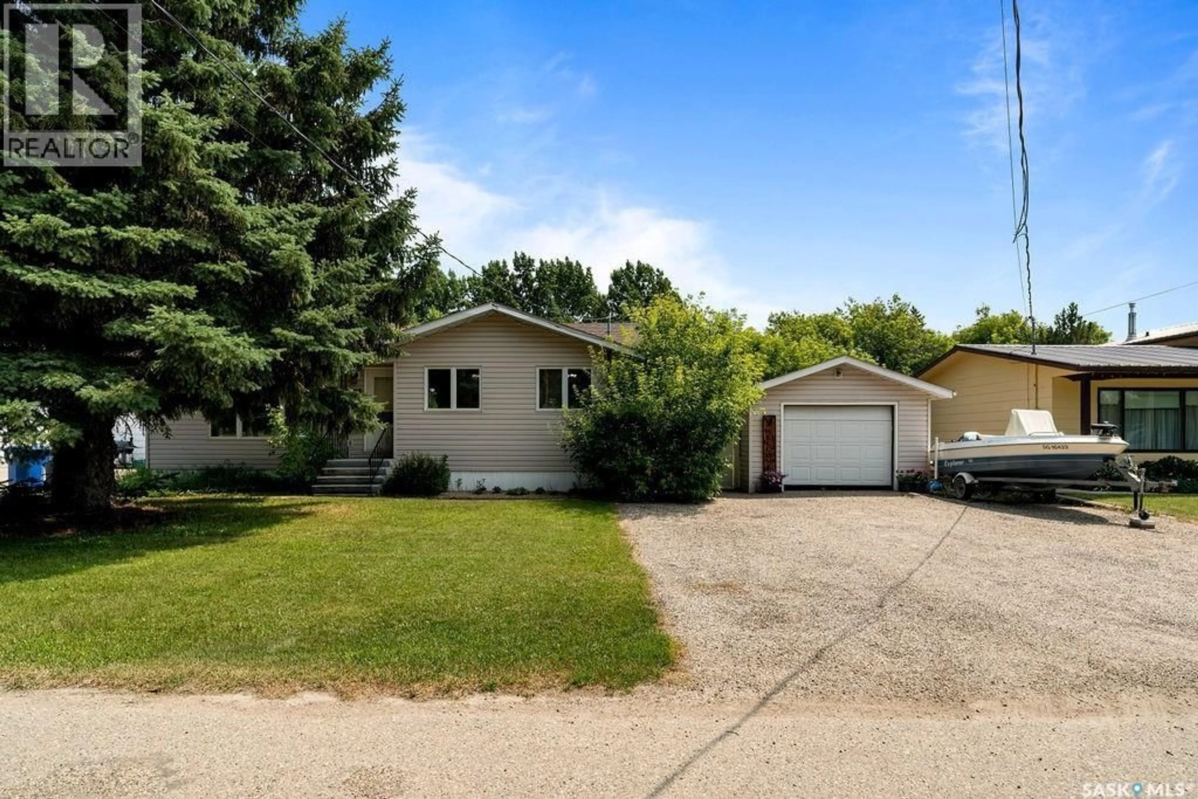 Home with vinyl exterior material, street for 105 ASH STREET, Wolseley Saskatchewan S0G5H0