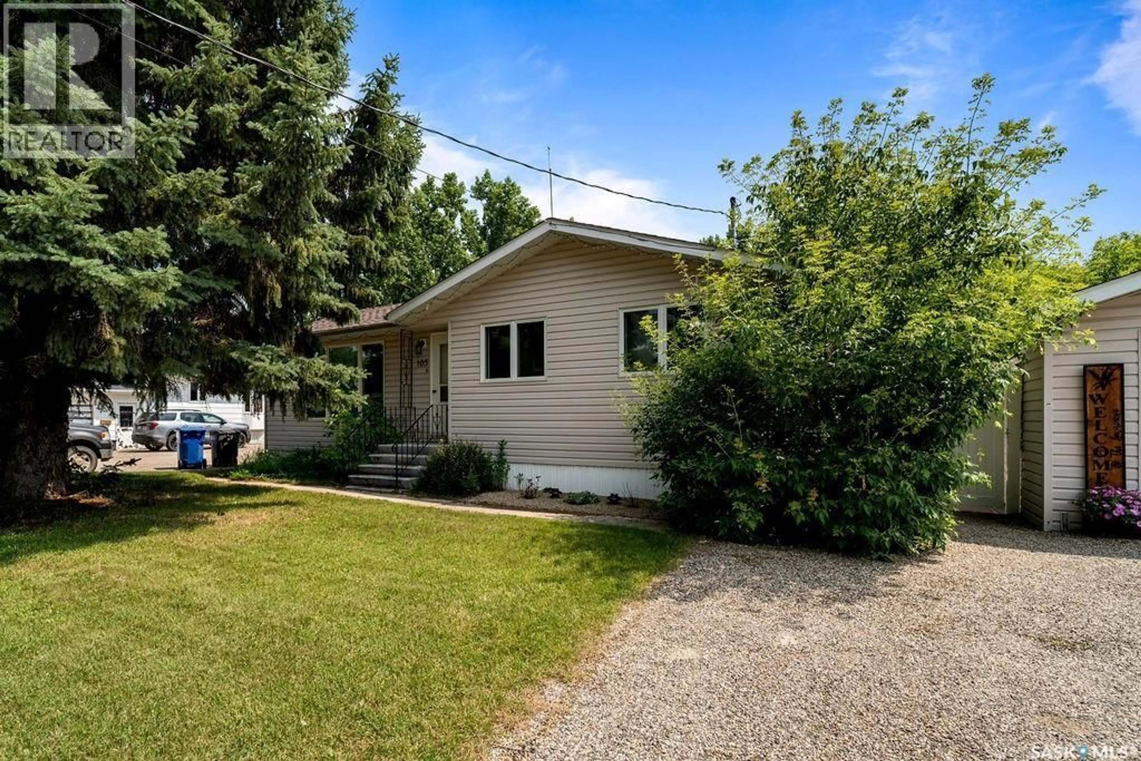 Home with vinyl exterior material, street for 105 ASH STREET, Wolseley Saskatchewan S0G5H0