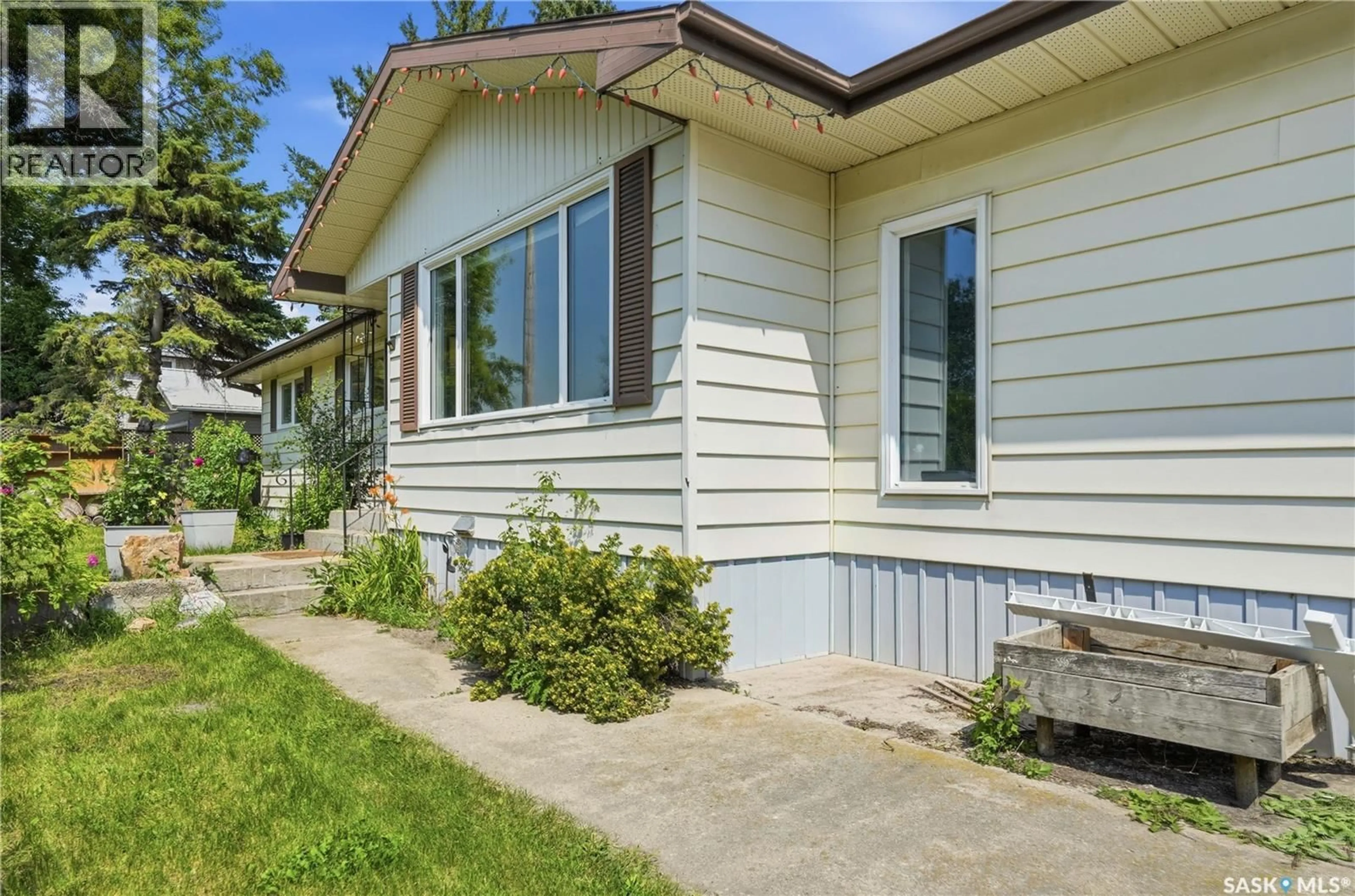 Home with vinyl exterior material, street for 133 POLLARD STREET, Earl Grey Saskatchewan S0G1J0